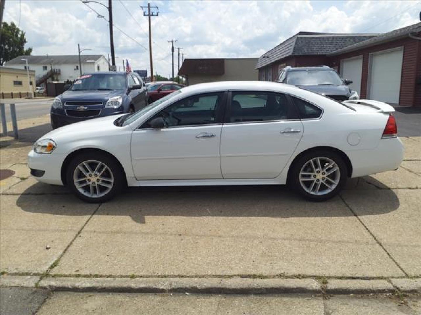 2014 Summit White Chevrolet Impala Limited LTZ Fleet (2G1WC5E39E1) with an 3.6L 3.6L Flex Fuel V6 300hp 262ft. lbs. Fuel Injected engine, 6-Speed Shiftable Automatic w/Overdrive transmission, located at 5505 N. Summit St., Toledo, OH, 43611, (419) 729-2688, 41.654953, -83.530014 - Photo#46