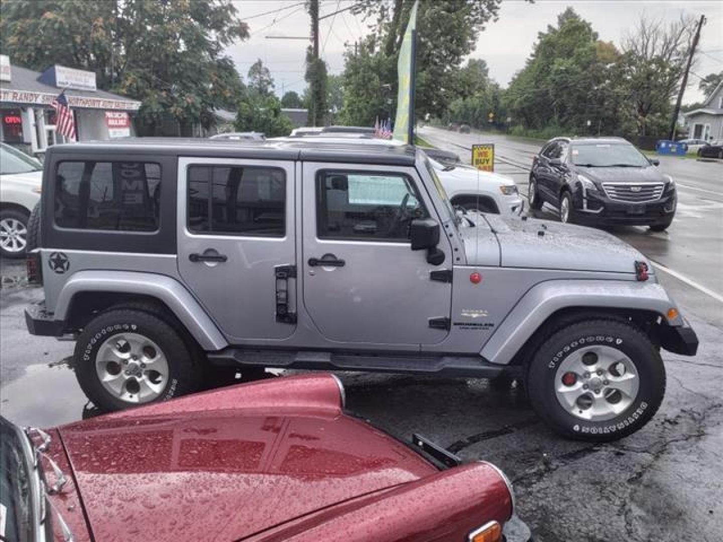 2015 Billet Silver Metallic Clear Coat Jeep Wrangler Unlimited Sahara (1C4BJWEG1FL) with an 3.6L 3.6L V6 285hp 260ft. lbs. Sequential Multiport Fuel Injection engine, 5-Speed Automatic transmission, located at 5505 N. Summit St., Toledo, OH, 43611, (419) 729-2688, 41.654953, -83.530014 - Photo#0