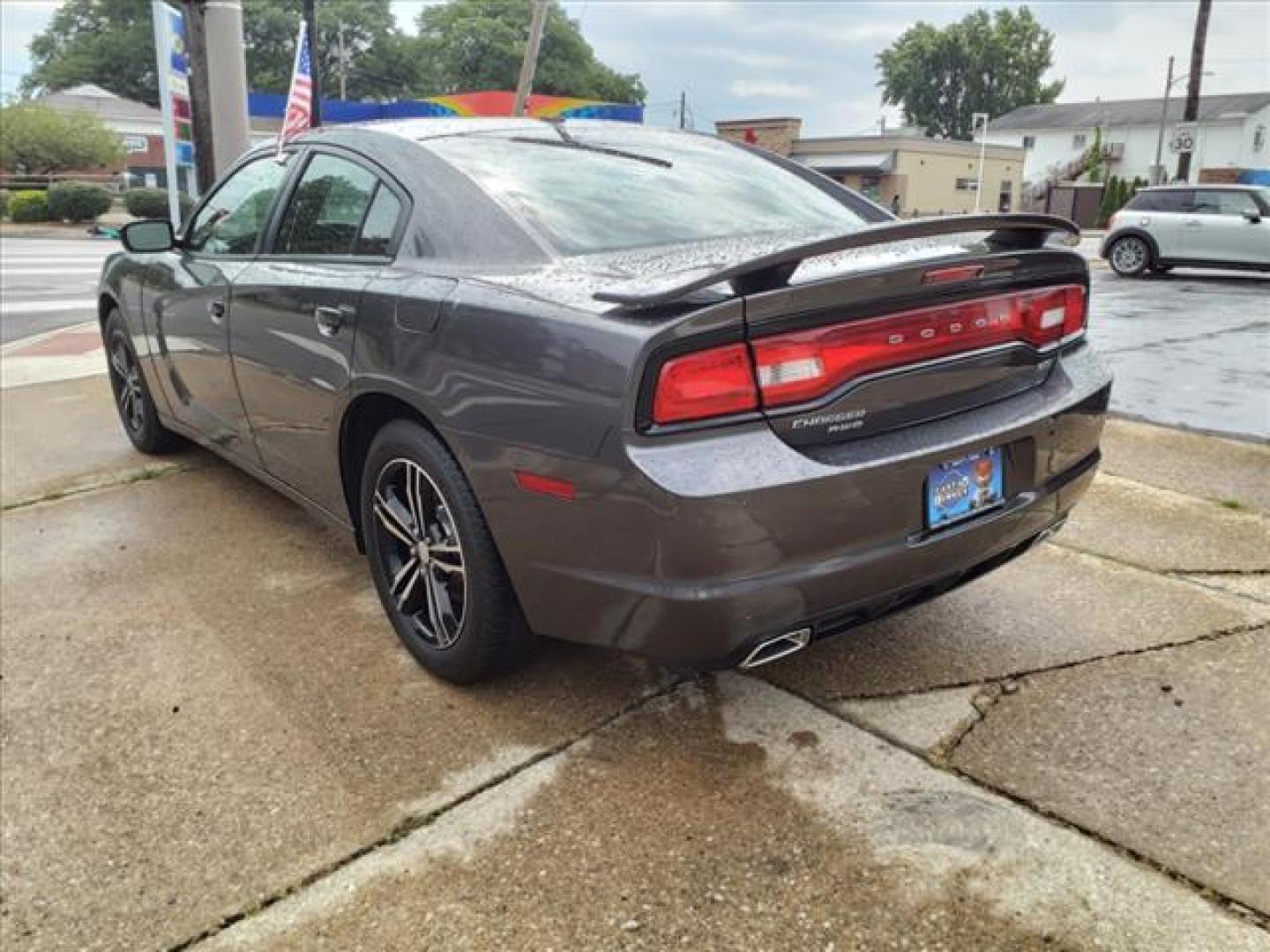 2014 Granite Crystal Metallic Clear Coat Dodge Charger AWD SXT Plus (2C3CDXJG0EH) with an 3.6L Pentastar 3.6L V6 292hp 260ft. lbs. Sequential Multiport Fuel Injection engine, 8-Speed Shiftable Automatic transmission, located at 5505 N. Summit St., Toledo, OH, 43611, (419) 729-2688, 41.654953, -83.530014 - Photo#24