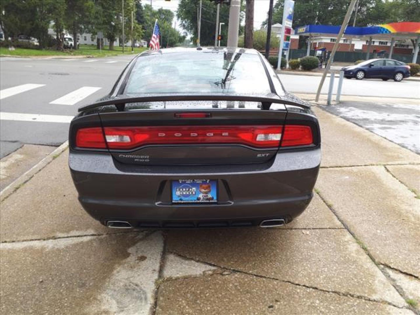 2014 Granite Crystal Metallic Clear Coat Dodge Charger AWD SXT Plus (2C3CDXJG0EH) with an 3.6L Pentastar 3.6L V6 292hp 260ft. lbs. Sequential Multiport Fuel Injection engine, 8-Speed Shiftable Automatic transmission, located at 5505 N. Summit St., Toledo, OH, 43611, (419) 729-2688, 41.654953, -83.530014 - Photo#25