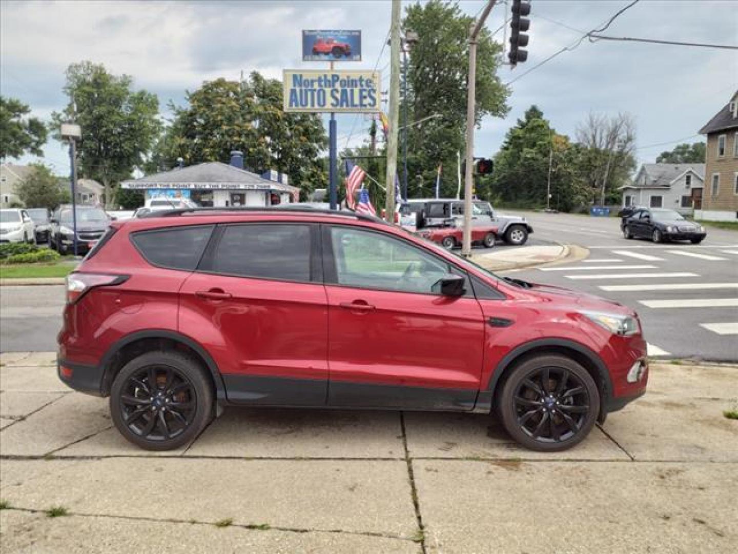 2017 Ruby Red Metallic Tinted Clearcoat Ford Escape SE (1FMCU0G95HU) with an 2.0L EcoBoost 2.0L Turbo I4 245hp 275ft. lbs. Direct Injection engine, 6-Speed Shiftable Automatic transmission, located at 5505 N. Summit St., Toledo, OH, 43611, (419) 729-2688, 41.654953, -83.530014 - Photo#0