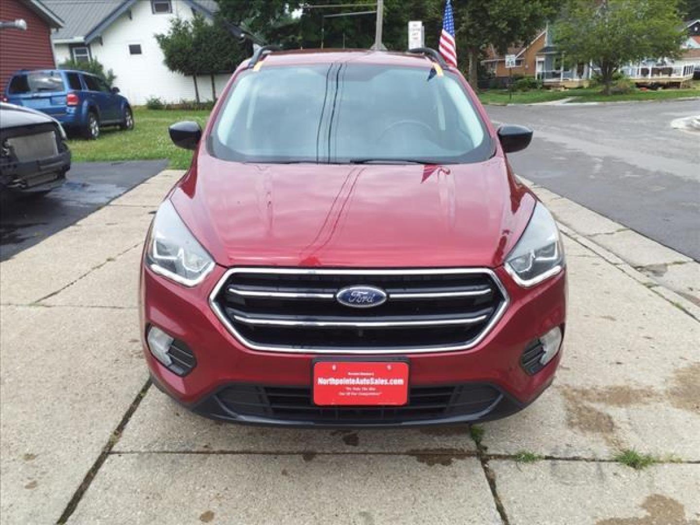 2017 Ruby Red Metallic Tinted Clearcoat Ford Escape SE (1FMCU0G95HU) with an 2.0L EcoBoost 2.0L Turbo I4 245hp 275ft. lbs. Direct Injection engine, 6-Speed Shiftable Automatic transmission, located at 5505 N. Summit St., Toledo, OH, 43611, (419) 729-2688, 41.654953, -83.530014 - Photo#20