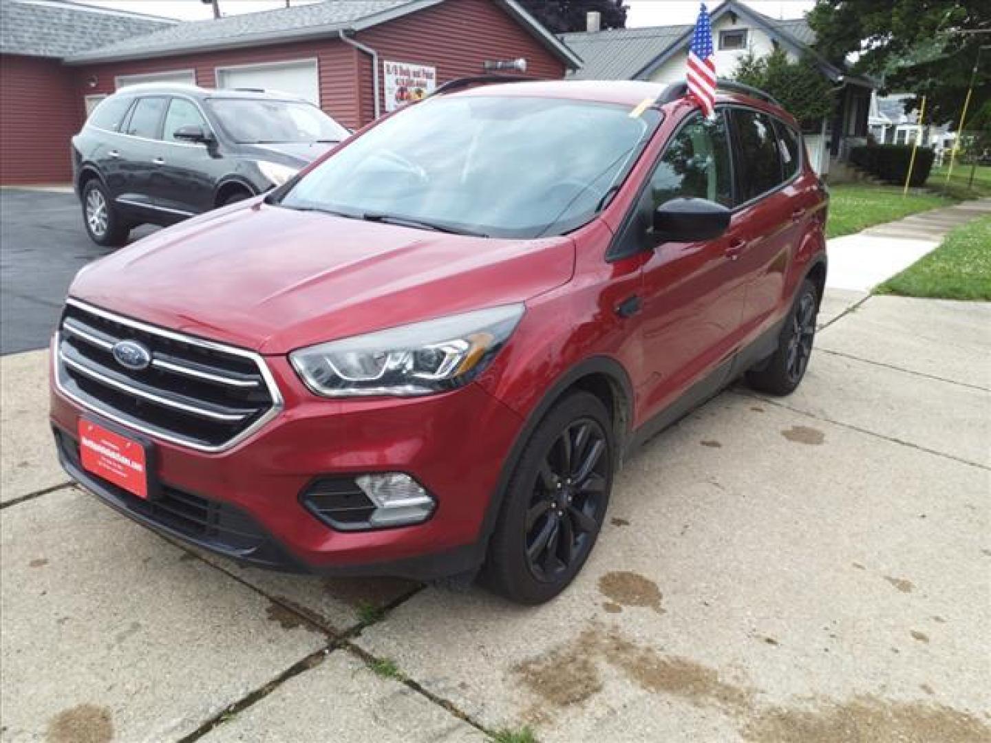 2017 Ruby Red Metallic Tinted Clearcoat Ford Escape SE (1FMCU0G95HU) with an 2.0L EcoBoost 2.0L Turbo I4 245hp 275ft. lbs. Direct Injection engine, 6-Speed Shiftable Automatic transmission, located at 5505 N. Summit St., Toledo, OH, 43611, (419) 729-2688, 41.654953, -83.530014 - Photo#21