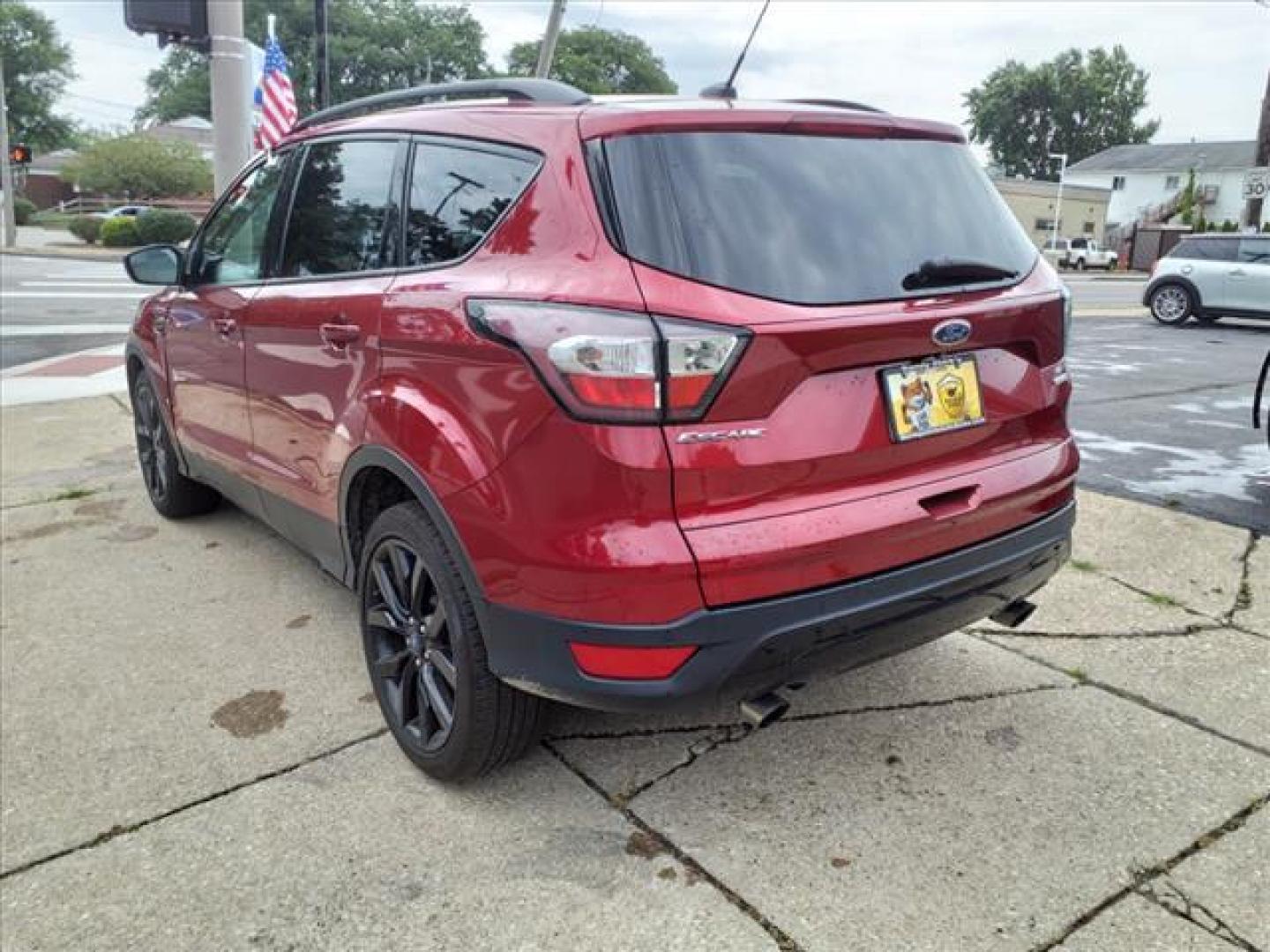 2017 Ruby Red Metallic Tinted Clearcoat Ford Escape SE (1FMCU0G95HU) with an 2.0L EcoBoost 2.0L Turbo I4 245hp 275ft. lbs. Direct Injection engine, 6-Speed Shiftable Automatic transmission, located at 5505 N. Summit St., Toledo, OH, 43611, (419) 729-2688, 41.654953, -83.530014 - Photo#23