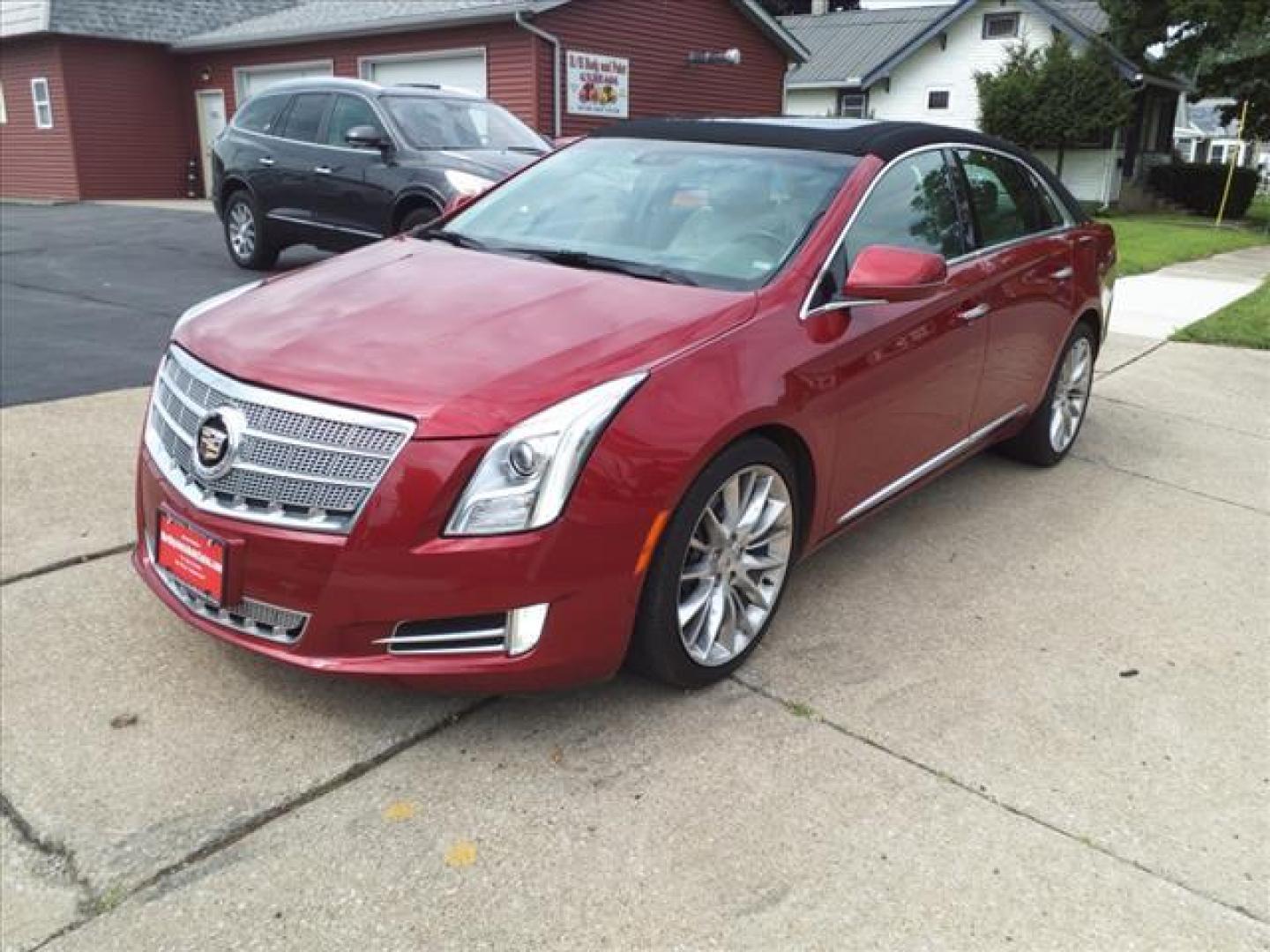 2013 Crystal Red Tintcoat Cadillac XTS AWD Platinum Collection (2G61V5S37D9) with an 3.6L 3.6L V6 304hp 264ft. lbs. Direct Injection engine, 6-Speed Shiftable Automatic transmission, located at 5505 N. Summit St., Toledo, OH, 43611, (419) 729-2688, 41.654953, -83.530014 - Photo#23