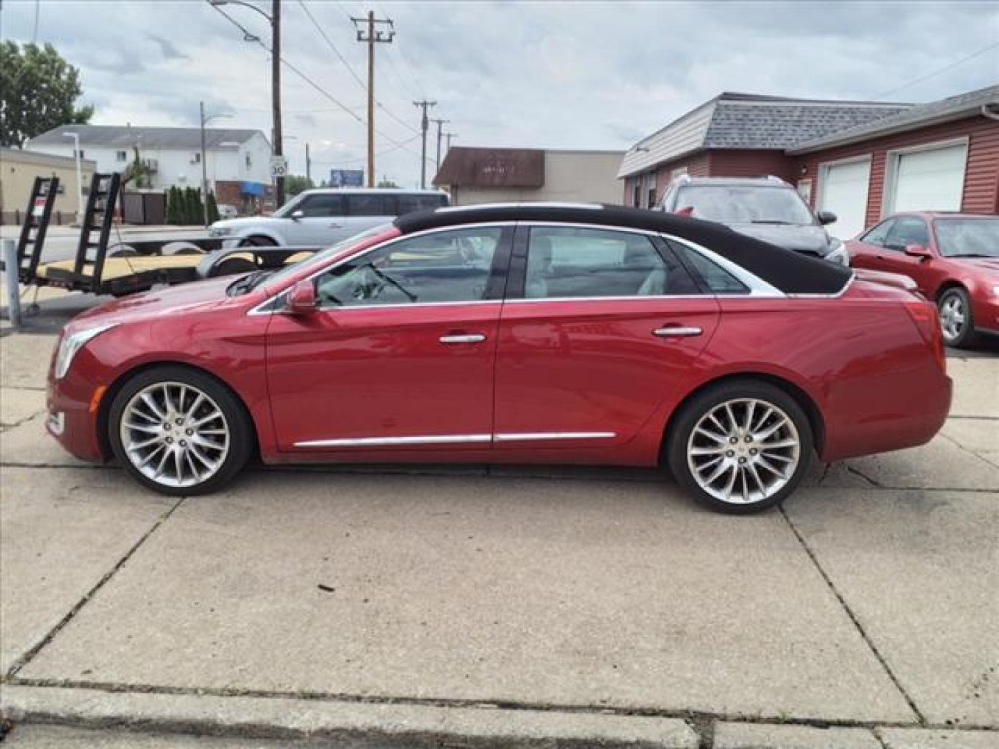 2013 Crystal Red Tintcoat Cadillac XTS AWD Platinum Collection (2G61V5S37D9) with an 3.6L 3.6L V6 304hp 264ft. lbs. Direct Injection engine, 6-Speed Shiftable Automatic transmission, located at 5505 N. Summit St., Toledo, OH, 43611, (419) 729-2688, 41.654953, -83.530014 - Photo#24