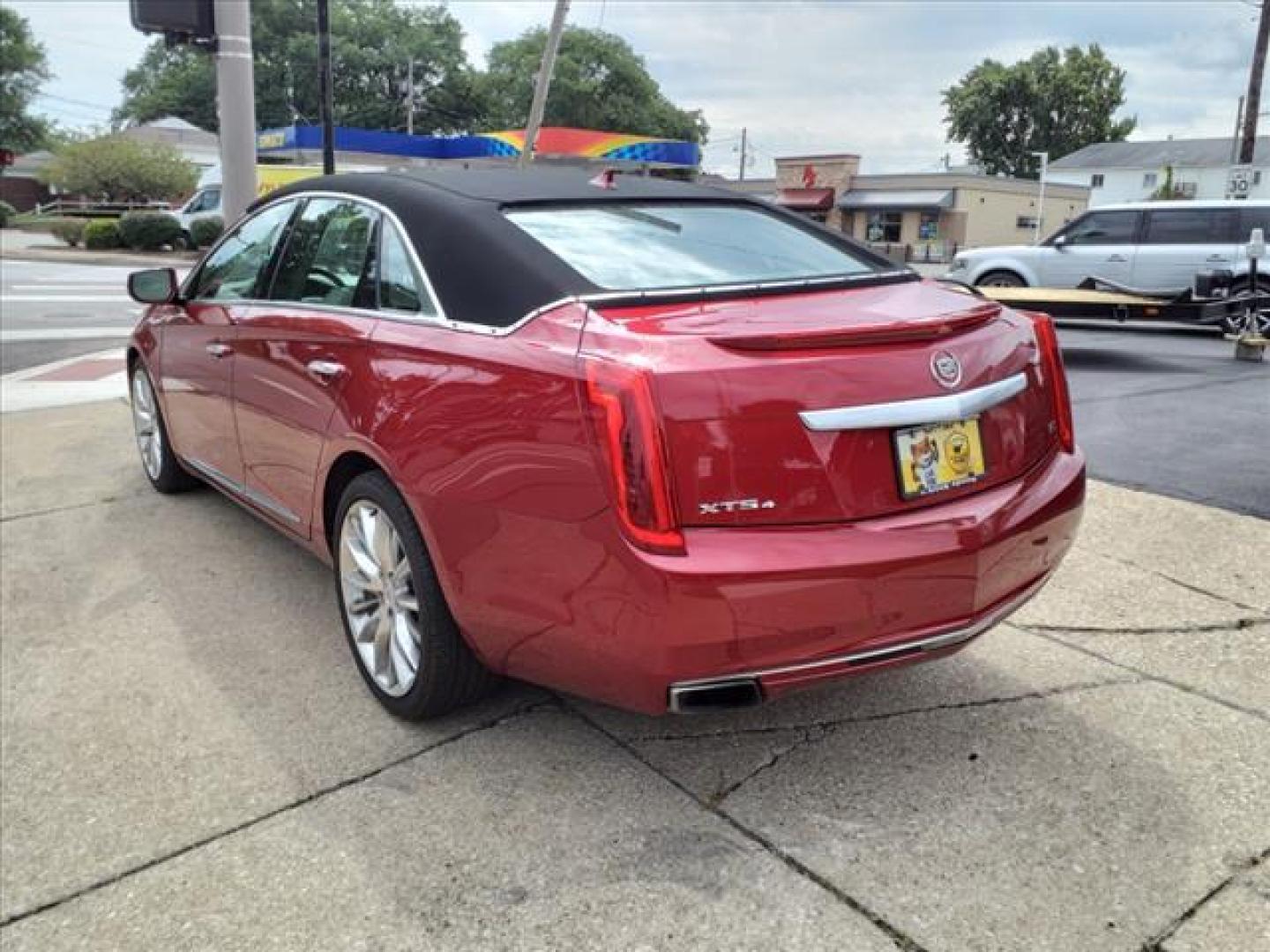 2013 Crystal Red Tintcoat Cadillac XTS AWD Platinum Collection (2G61V5S37D9) with an 3.6L 3.6L V6 304hp 264ft. lbs. Direct Injection engine, 6-Speed Shiftable Automatic transmission, located at 5505 N. Summit St., Toledo, OH, 43611, (419) 729-2688, 41.654953, -83.530014 - Photo#25