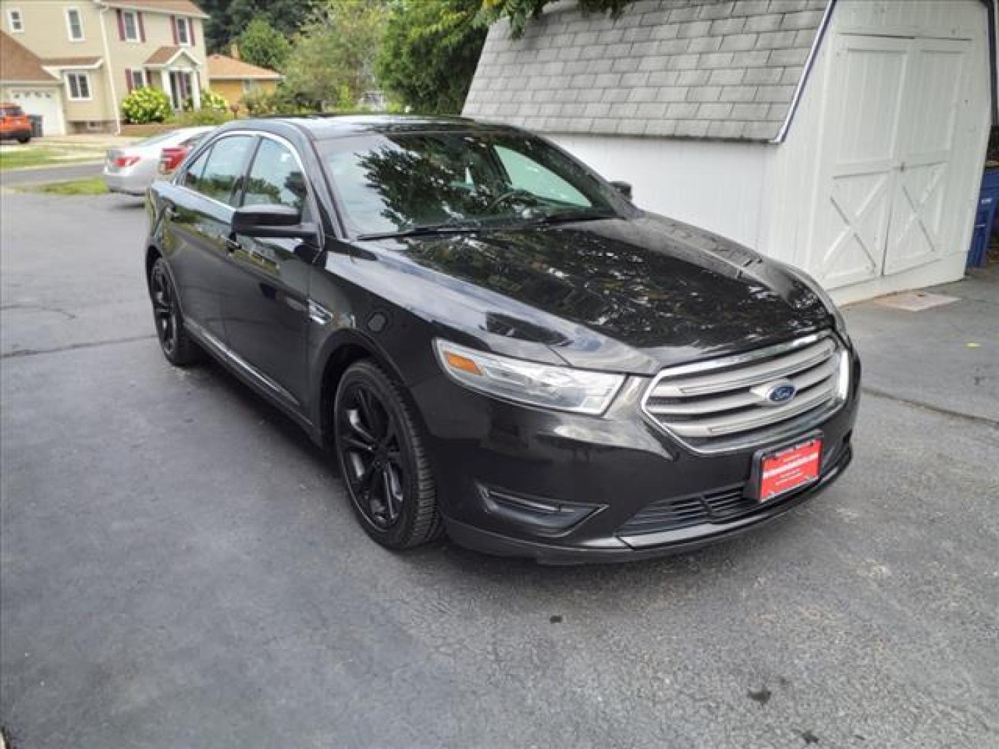 2013 Tuxedo Black Metallic Ford Taurus AWD SEL (1FAHP2H8XDG) with an 3.5L 3.5L V6 288hp 254ft. lbs. Sequential Multiport Fuel Injection engine, 6-Speed Shiftable Automatic transmission, located at 5505 N. Summit St., Toledo, OH, 43611, (419) 729-2688, 41.654953, -83.530014 - Photo#14