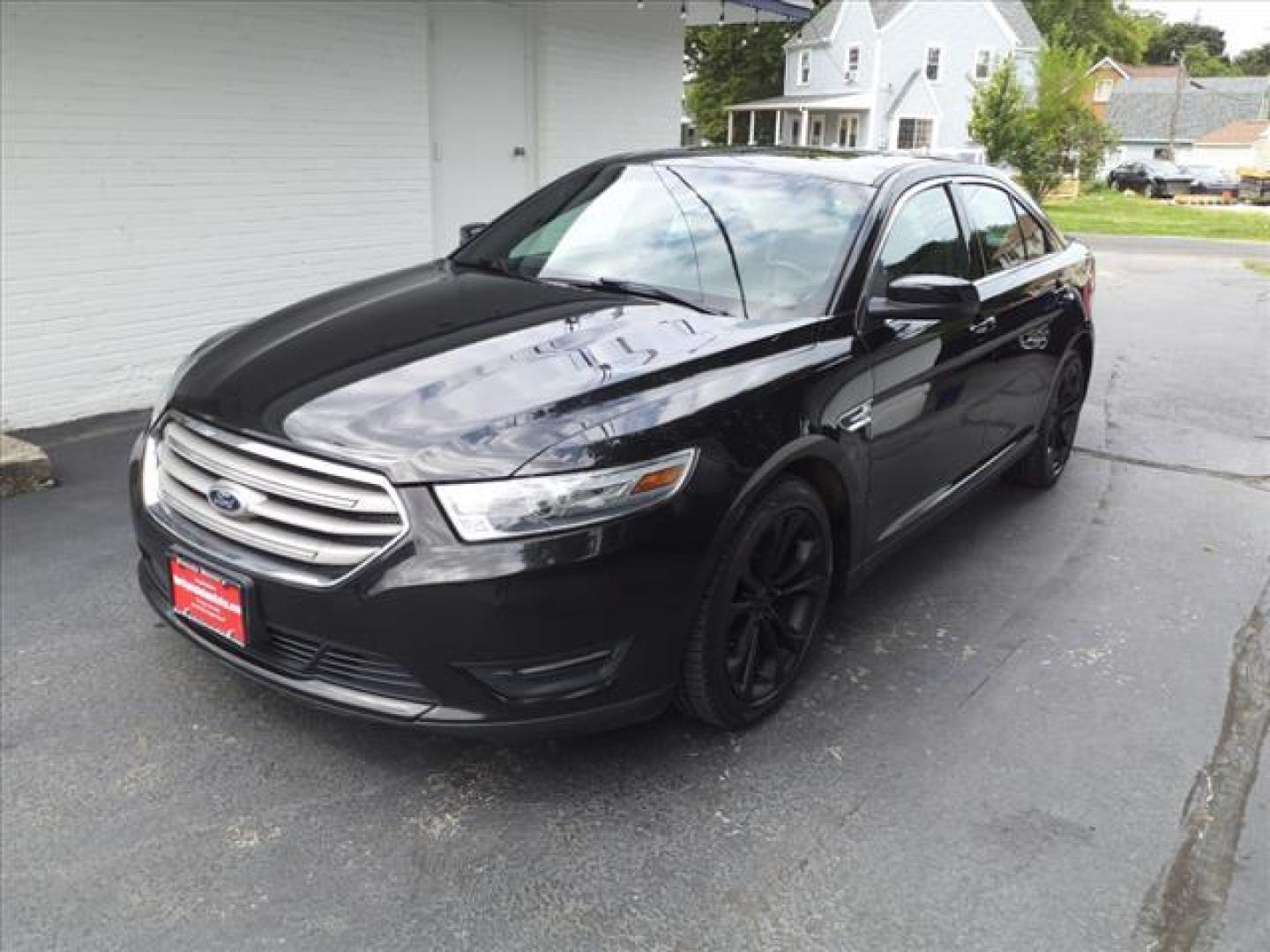 2013 Tuxedo Black Metallic Ford Taurus AWD SEL (1FAHP2H8XDG) with an 3.5L 3.5L V6 288hp 254ft. lbs. Sequential Multiport Fuel Injection engine, 6-Speed Shiftable Automatic transmission, located at 5505 N. Summit St., Toledo, OH, 43611, (419) 729-2688, 41.654953, -83.530014 - Photo#16