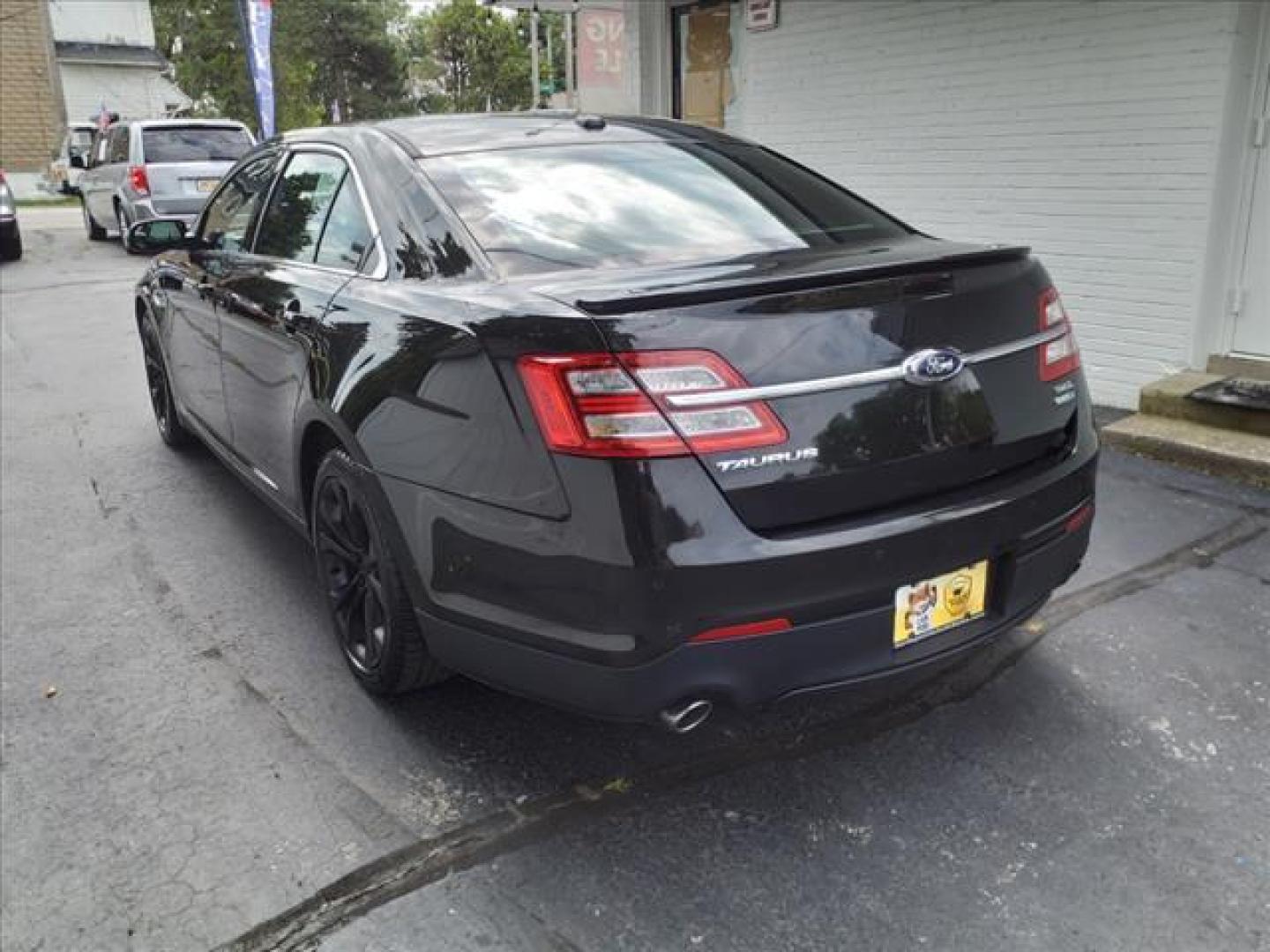 2013 Tuxedo Black Metallic Ford Taurus AWD SEL (1FAHP2H8XDG) with an 3.5L 3.5L V6 288hp 254ft. lbs. Sequential Multiport Fuel Injection engine, 6-Speed Shiftable Automatic transmission, located at 5505 N. Summit St., Toledo, OH, 43611, (419) 729-2688, 41.654953, -83.530014 - Photo#17