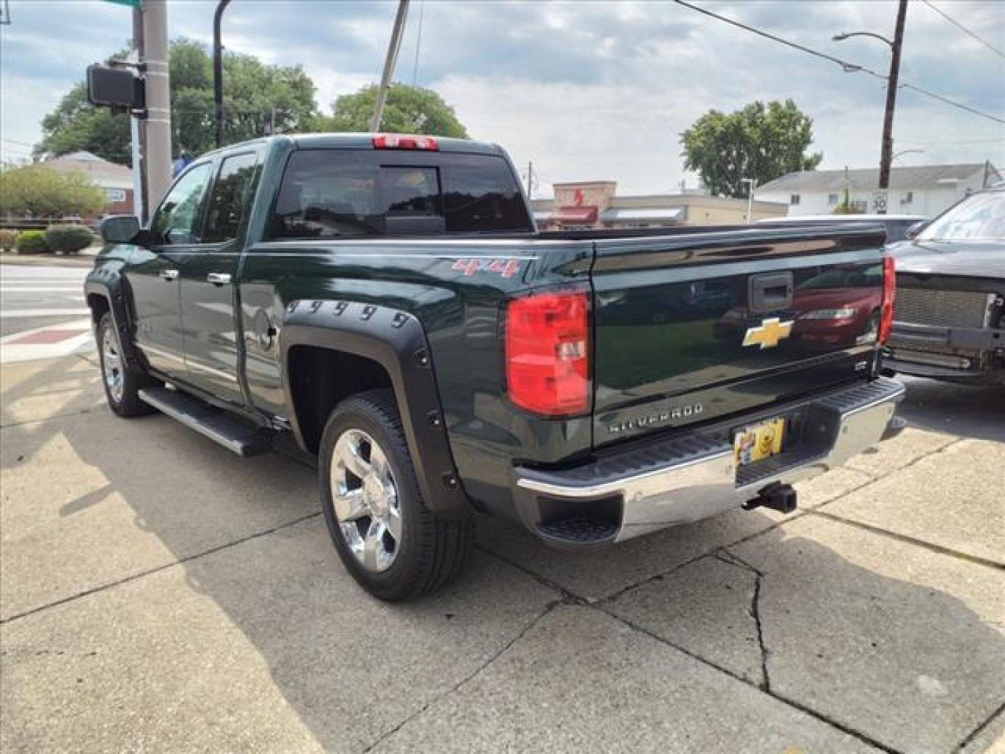 2014 Rainforest Green Metallic Chevrolet Silverado 1500 4x4 LTZ (1GCVKSEC0EZ) with an 5.3L EcoTec3 5.3L Flex Fuel V8 355hp 383ft. lbs. Direct Injection engine, 6-Speed Shiftable Automatic w/Overdrive transmission, located at 5505 N. Summit St., Toledo, OH, 43611, (419) 729-2688, 41.654953, -83.530014 - Photo#23