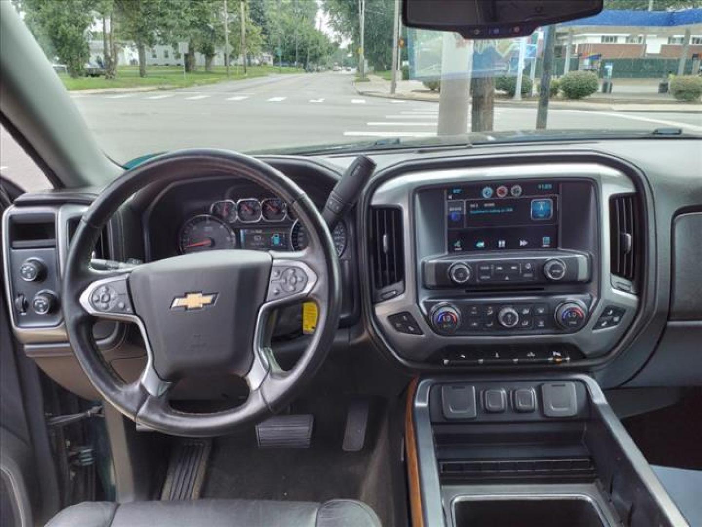 2014 Rainforest Green Metallic Chevrolet Silverado 1500 4x4 LTZ (1GCVKSEC0EZ) with an 5.3L EcoTec3 5.3L Flex Fuel V8 355hp 383ft. lbs. Direct Injection engine, 6-Speed Shiftable Automatic w/Overdrive transmission, located at 5505 N. Summit St., Toledo, OH, 43611, (419) 729-2688, 41.654953, -83.530014 - Photo#4