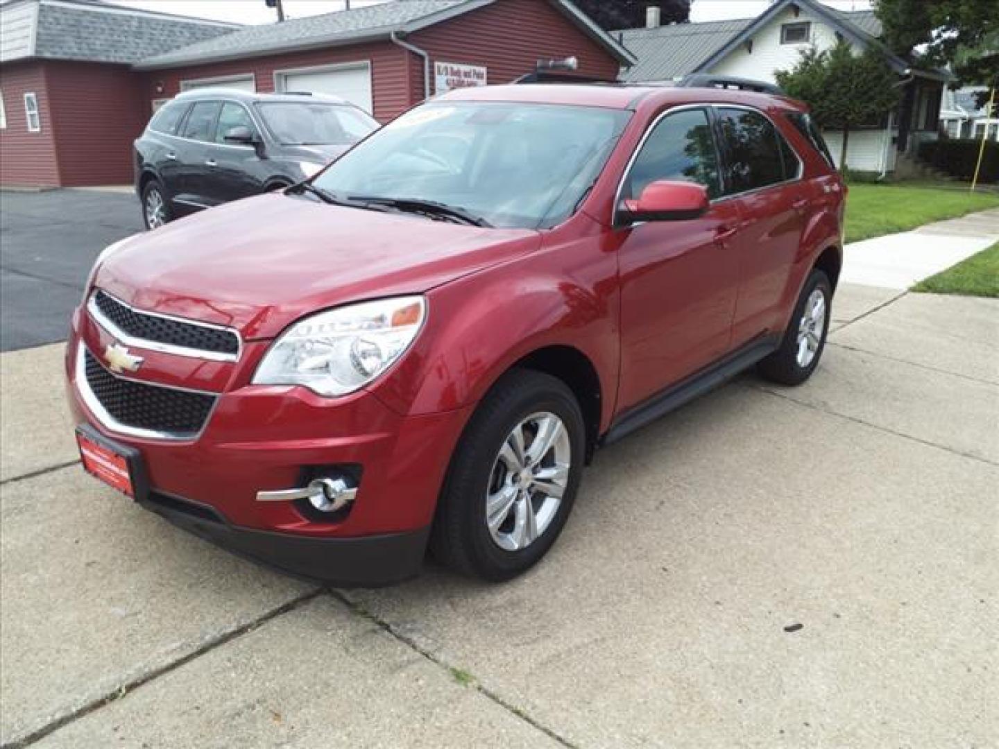 2013 Crystal Red Tintcoat Chevrolet Equinox LT (2GNFLPE33D6) with an 3.6L 3.6L V6 301hp 272ft. lbs. Direct Injection engine, 6-Speed Shiftable Automatic transmission, located at 5505 N. Summit St., Toledo, OH, 43611, (419) 729-2688, 41.654953, -83.530014 - Photo#22