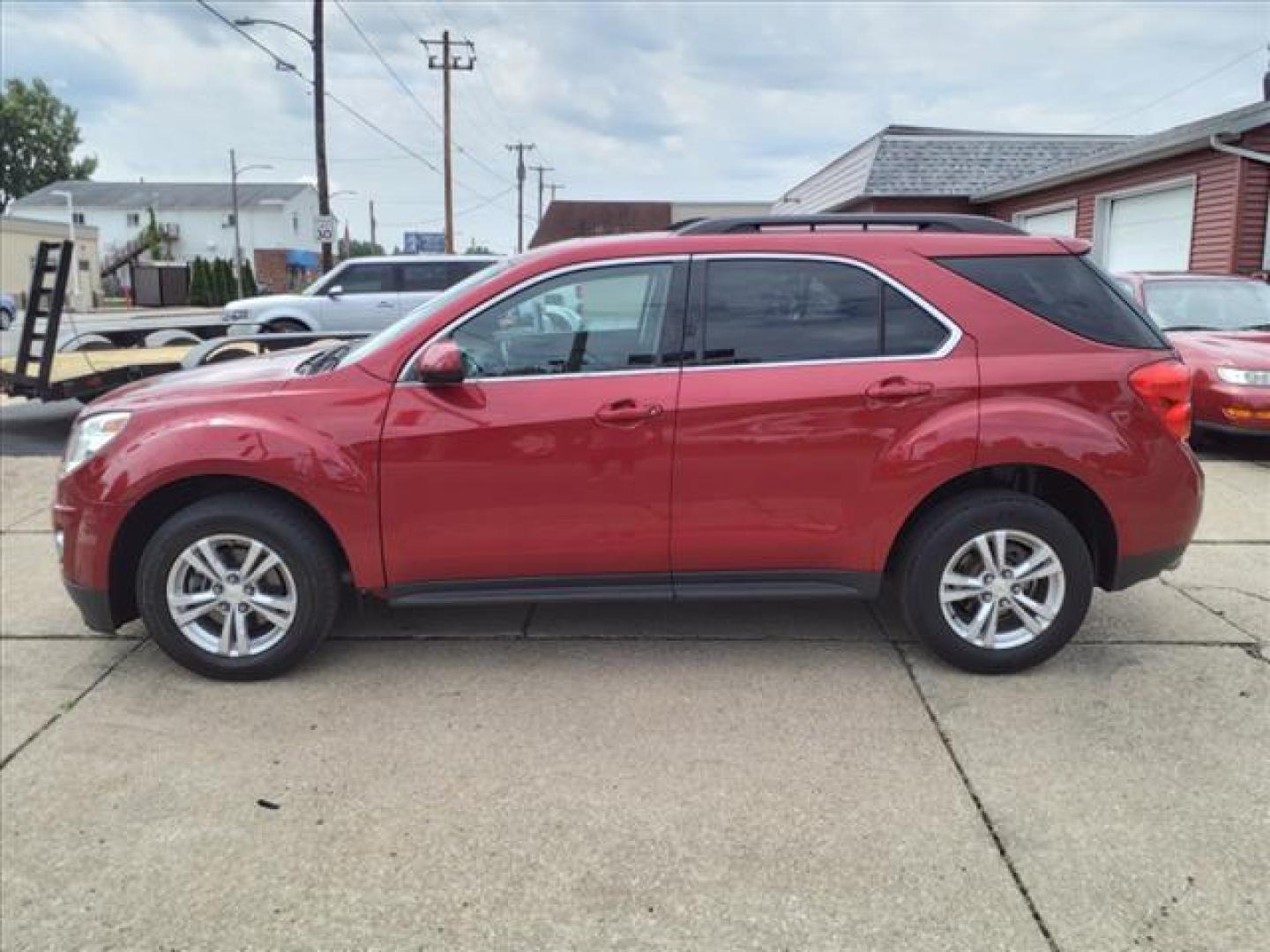 2013 Crystal Red Tintcoat Chevrolet Equinox LT (2GNFLPE33D6) with an 3.6L 3.6L V6 301hp 272ft. lbs. Direct Injection engine, 6-Speed Shiftable Automatic transmission, located at 5505 N. Summit St., Toledo, OH, 43611, (419) 729-2688, 41.654953, -83.530014 - Photo#23