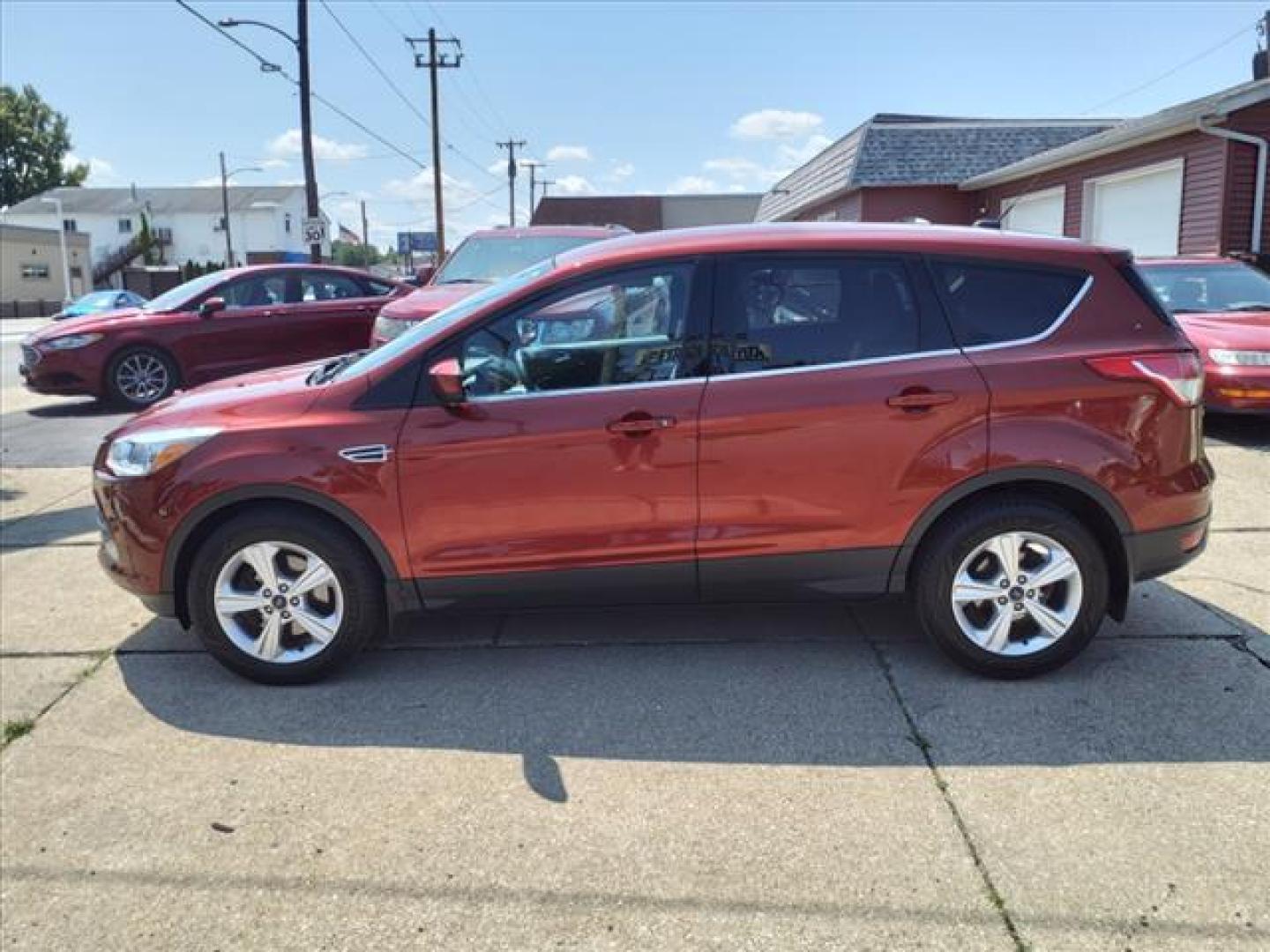 2015 Sunset Metallic Ford Escape SE (1FMCU9G90FU) with an 2.0L EcoBoost 2.0L Turbo I4 240hp 270ft. lbs. Direct Injection engine, 6-Speed Shiftable Automatic transmission, located at 5505 N. Summit St., Toledo, OH, 43611, (419) 729-2688, 41.654953, -83.530014 - Photo#20