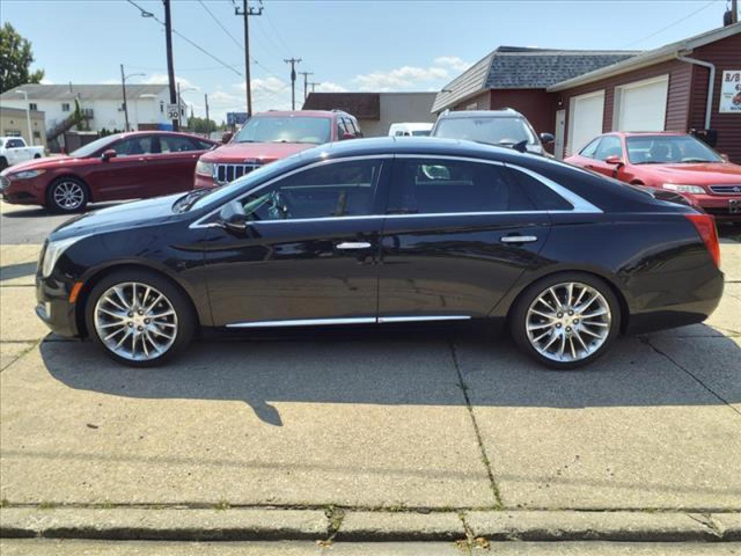 2013 Black Raven Cadillac XTS AWD Platinum Collection (2G61V5S31D9) with an 3.6L 3.6L V6 304hp 264ft. lbs. Direct Injection engine, 6-Speed Shiftable Automatic transmission, located at 5505 N. Summit St., Toledo, OH, 43611, (419) 729-2688, 41.654953, -83.530014 - Photo#24