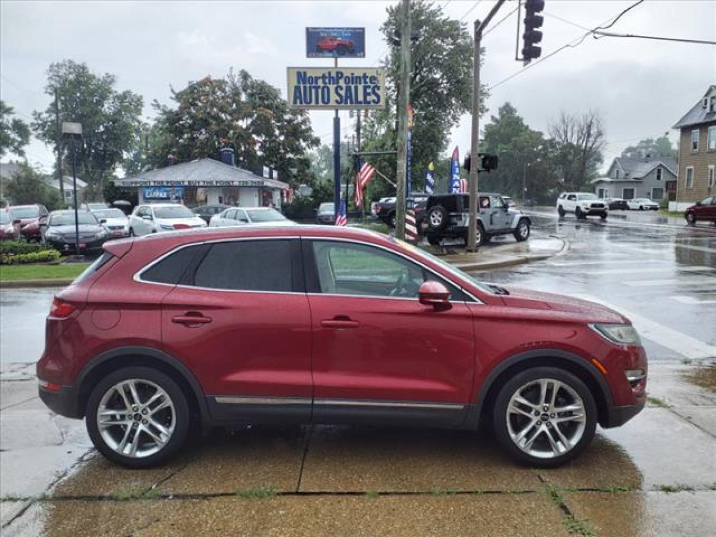 2015 Ruby Red Metallic Tinted Clearcoat Lincoln MKC AWD Base (5LMTJ2AH5FU) with an 2.3L EcoBoost 2.3L Turbo I4 285hp 305ft. lbs. Direct Injection engine, 6-Speed Shiftable Automatic transmission, located at 5505 N. Summit St., Toledo, OH, 43611, (419) 729-2688, 41.654953, -83.530014 - Photo#0