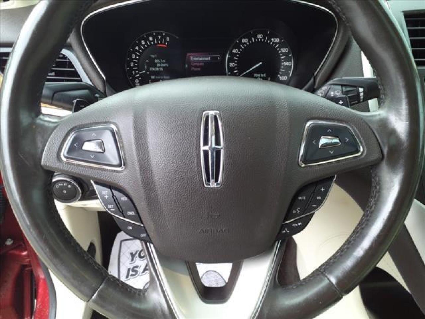 2015 Ruby Red Metallic Tinted Clearcoat Lincoln MKC AWD Base (5LMTJ2AH5FU) with an 2.3L EcoBoost 2.3L Turbo I4 285hp 305ft. lbs. Direct Injection engine, 6-Speed Shiftable Automatic transmission, located at 5505 N. Summit St., Toledo, OH, 43611, (419) 729-2688, 41.654953, -83.530014 - Photo#9