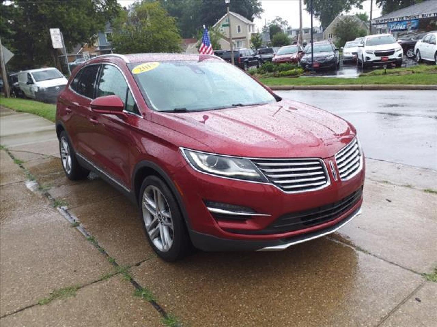 2015 Ruby Red Metallic Tinted Clearcoat Lincoln MKC AWD Base (5LMTJ2AH5FU) with an 2.3L EcoBoost 2.3L Turbo I4 285hp 305ft. lbs. Direct Injection engine, 6-Speed Shiftable Automatic transmission, located at 5505 N. Summit St., Toledo, OH, 43611, (419) 729-2688, 41.654953, -83.530014 - Photo#19