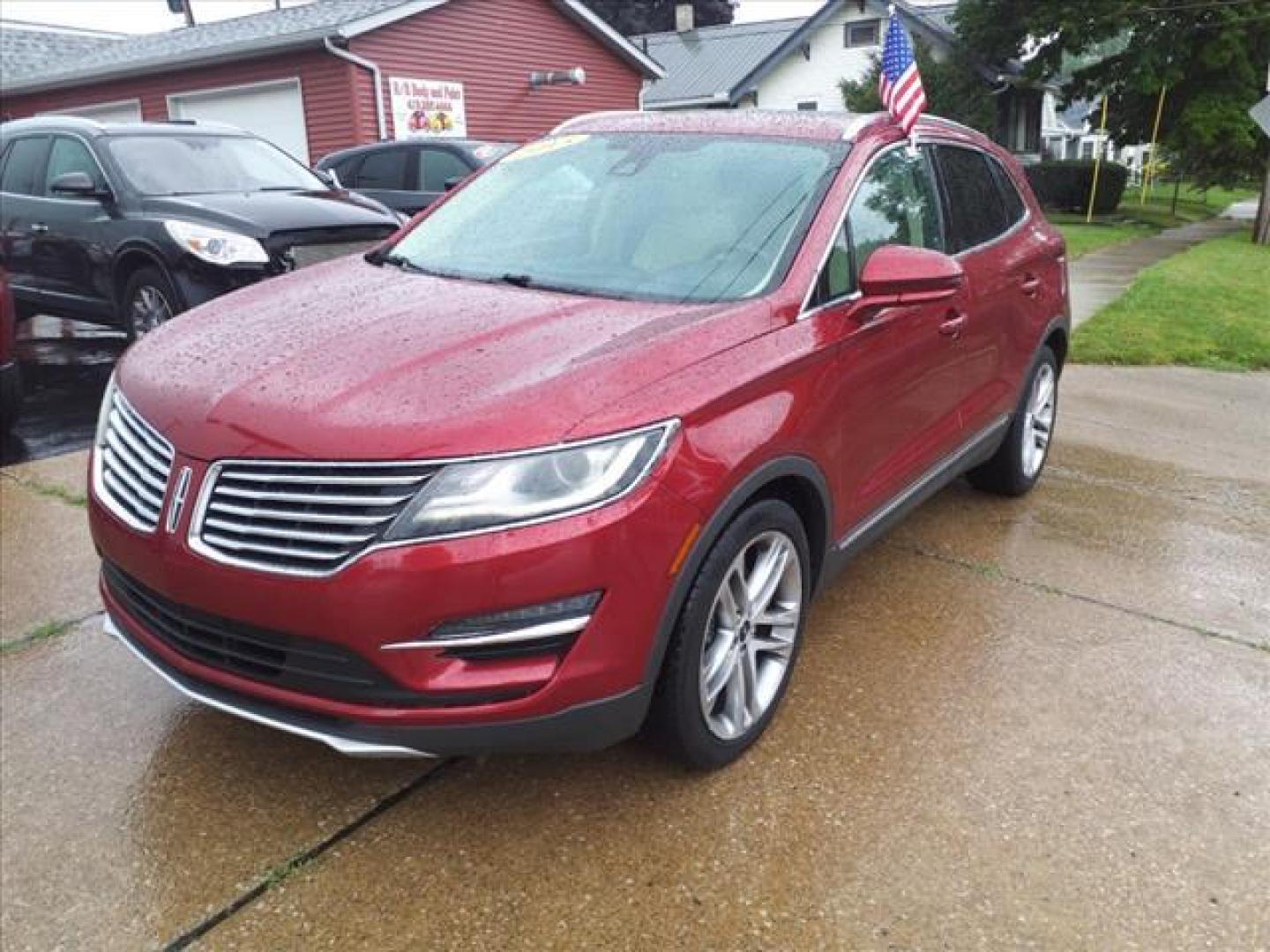 2015 Ruby Red Metallic Tinted Clearcoat Lincoln MKC AWD Base (5LMTJ2AH5FU) with an 2.3L EcoBoost 2.3L Turbo I4 285hp 305ft. lbs. Direct Injection engine, 6-Speed Shiftable Automatic transmission, located at 5505 N. Summit St., Toledo, OH, 43611, (419) 729-2688, 41.654953, -83.530014 - Photo#21