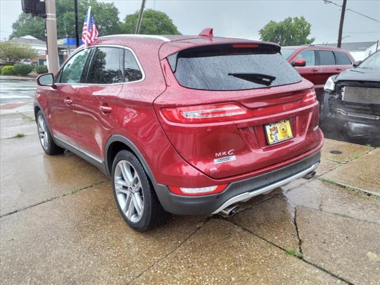 2015 Ruby Red Metallic Tinted Clearcoat Lincoln MKC AWD Base (5LMTJ2AH5FU) with an 2.3L EcoBoost 2.3L Turbo I4 285hp 305ft. lbs. Direct Injection engine, 6-Speed Shiftable Automatic transmission, located at 5505 N. Summit St., Toledo, OH, 43611, (419) 729-2688, 41.654953, -83.530014 - Photo#23