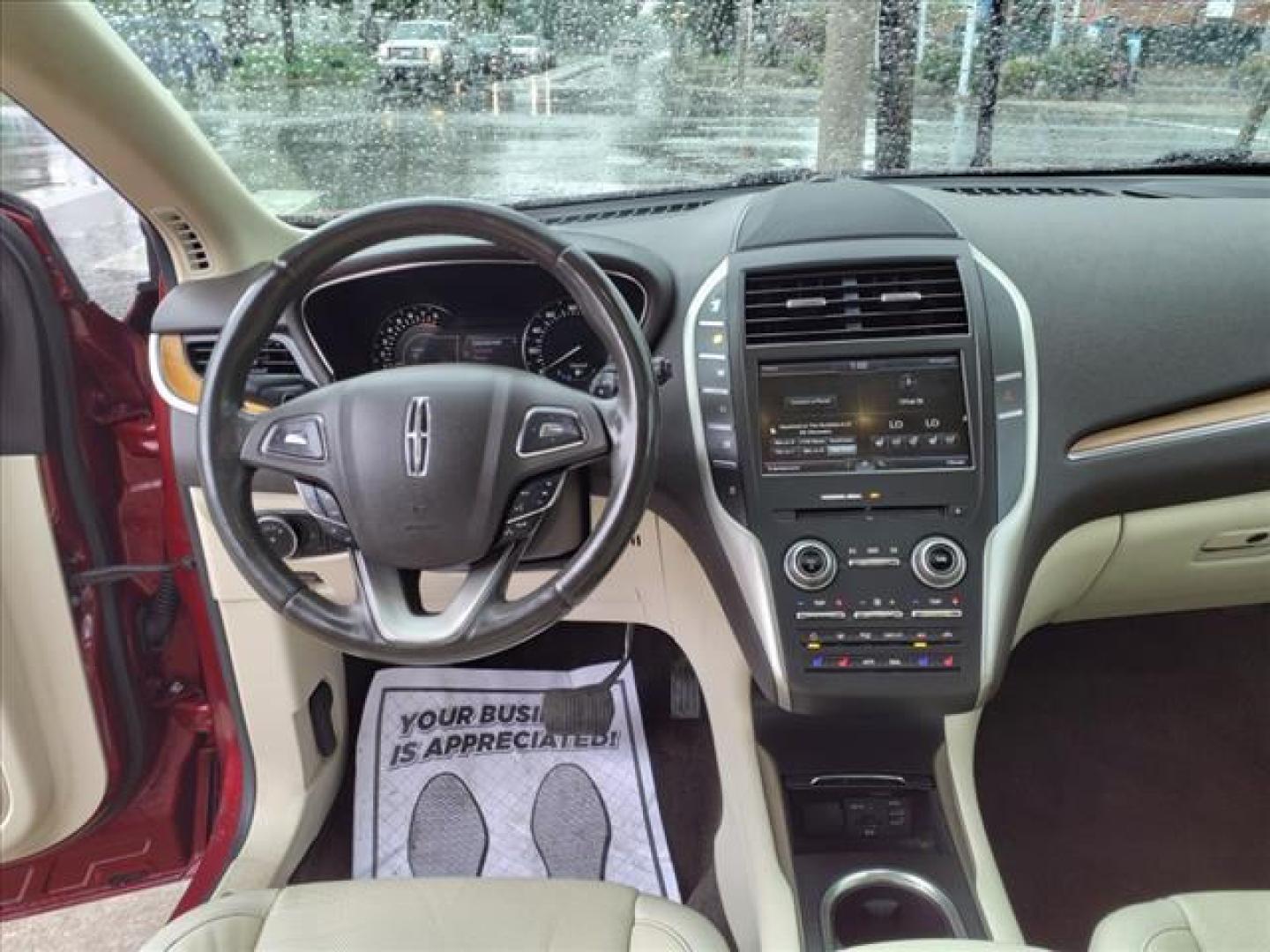 2015 Ruby Red Metallic Tinted Clearcoat Lincoln MKC AWD Base (5LMTJ2AH5FU) with an 2.3L EcoBoost 2.3L Turbo I4 285hp 305ft. lbs. Direct Injection engine, 6-Speed Shiftable Automatic transmission, located at 5505 N. Summit St., Toledo, OH, 43611, (419) 729-2688, 41.654953, -83.530014 - Photo#5