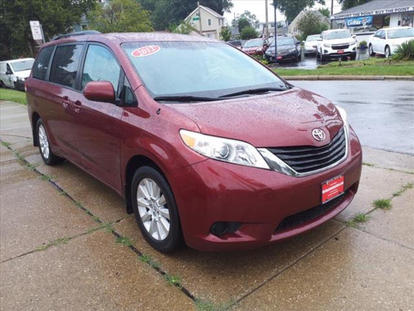 2012 Salsa Red Pearl Toyota Sienna AWD LE 7-Passenger (5TDJK3DC0CS) with an 3.5L 3.5L V6 266hp 245ft. lbs. Sequential Multiport Fuel Injection engine, 6-Speed Shiftable Automatic transmission, located at 5505 N. Summit St., Toledo, OH, 43611, (419) 729-2688, 41.654953, -83.530014 - Photo#17