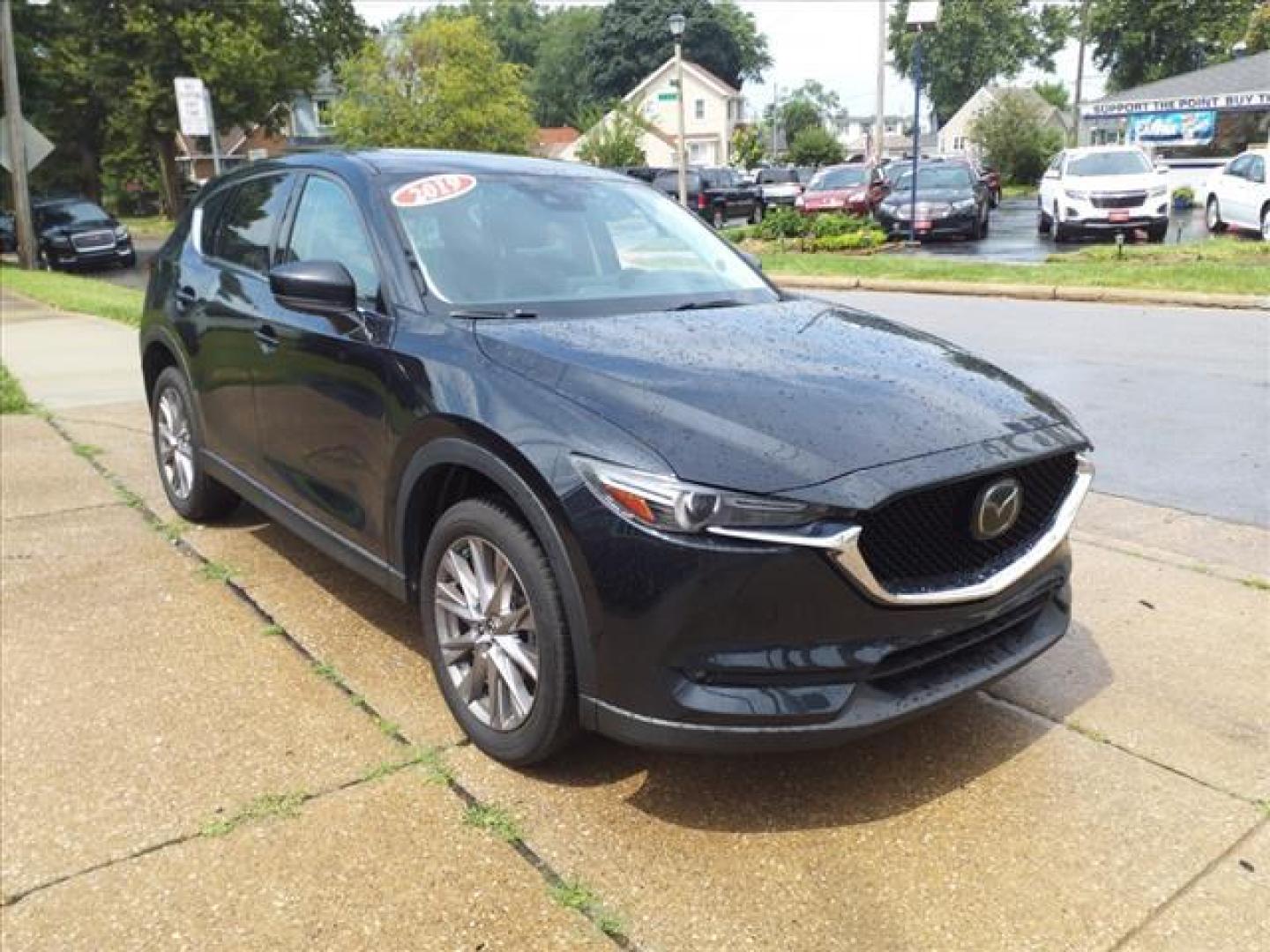 2019 Jet Black Mica Mazda CX-5 AWD Grand Touring (JM3KFBDM8K1) with an 2.5L SKYACTIV-G 2.5L I4 187hp 186ft. lbs. Direct Injection engine, 6-Speed Shiftable Automatic transmission, located at 5505 N. Summit St., Toledo, OH, 43611, (419) 729-2688, 41.654953, -83.530014 - Photo#20