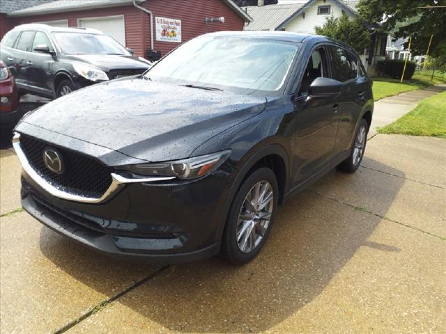 2019 Jet Black Mica Mazda CX-5 AWD Grand Touring (JM3KFBDM8K1) with an 2.5L SKYACTIV-G 2.5L I4 187hp 186ft. lbs. Direct Injection engine, 6-Speed Shiftable Automatic transmission, located at 5505 N. Summit St., Toledo, OH, 43611, (419) 729-2688, 41.654953, -83.530014 - Photo#22