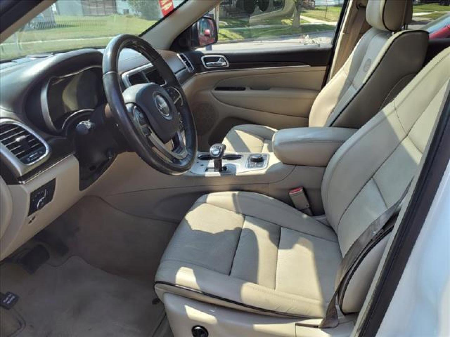 2014 Bright White Clear Coat Jeep Grand Cherokee 4x4 Overland (1C4RJFCG2EC) with an 3.6L 3.6L V6 290hp 260ft. lbs. Sequential Multiport Fuel Injection engine, 8-Speed Shiftable Automatic transmission, located at 5505 N. Summit St., Toledo, OH, 43611, (419) 729-2688, 41.654953, -83.530014 - Photo#2