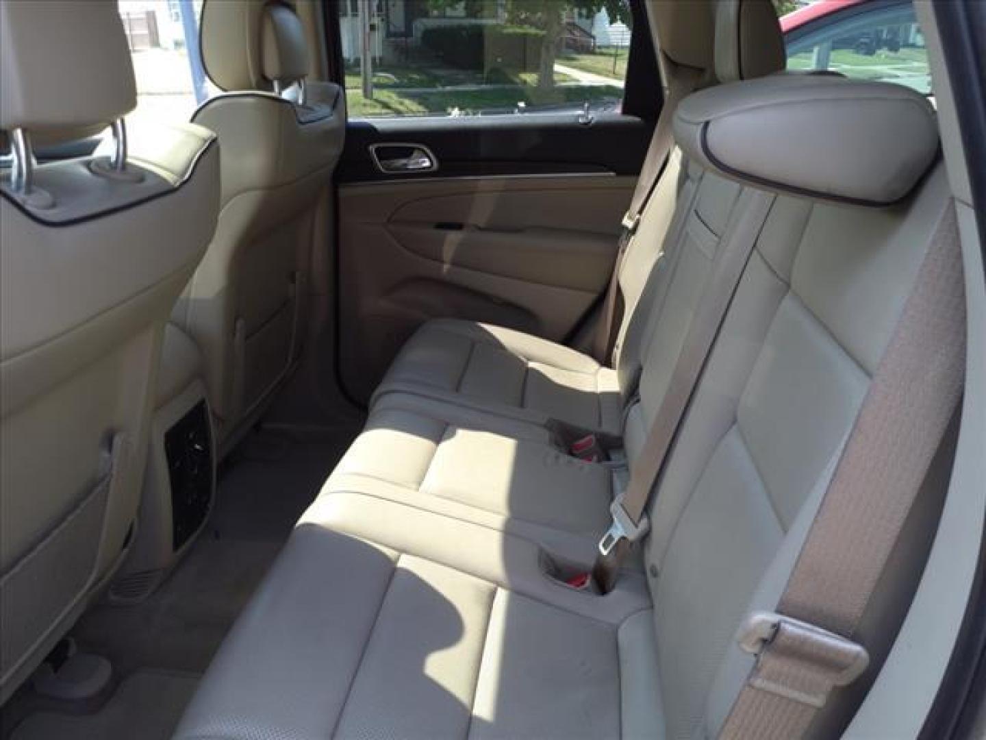 2014 Bright White Clear Coat Jeep Grand Cherokee 4x4 Overland (1C4RJFCG2EC) with an 3.6L 3.6L V6 290hp 260ft. lbs. Sequential Multiport Fuel Injection engine, 8-Speed Shiftable Automatic transmission, located at 5505 N. Summit St., Toledo, OH, 43611, (419) 729-2688, 41.654953, -83.530014 - Photo#4