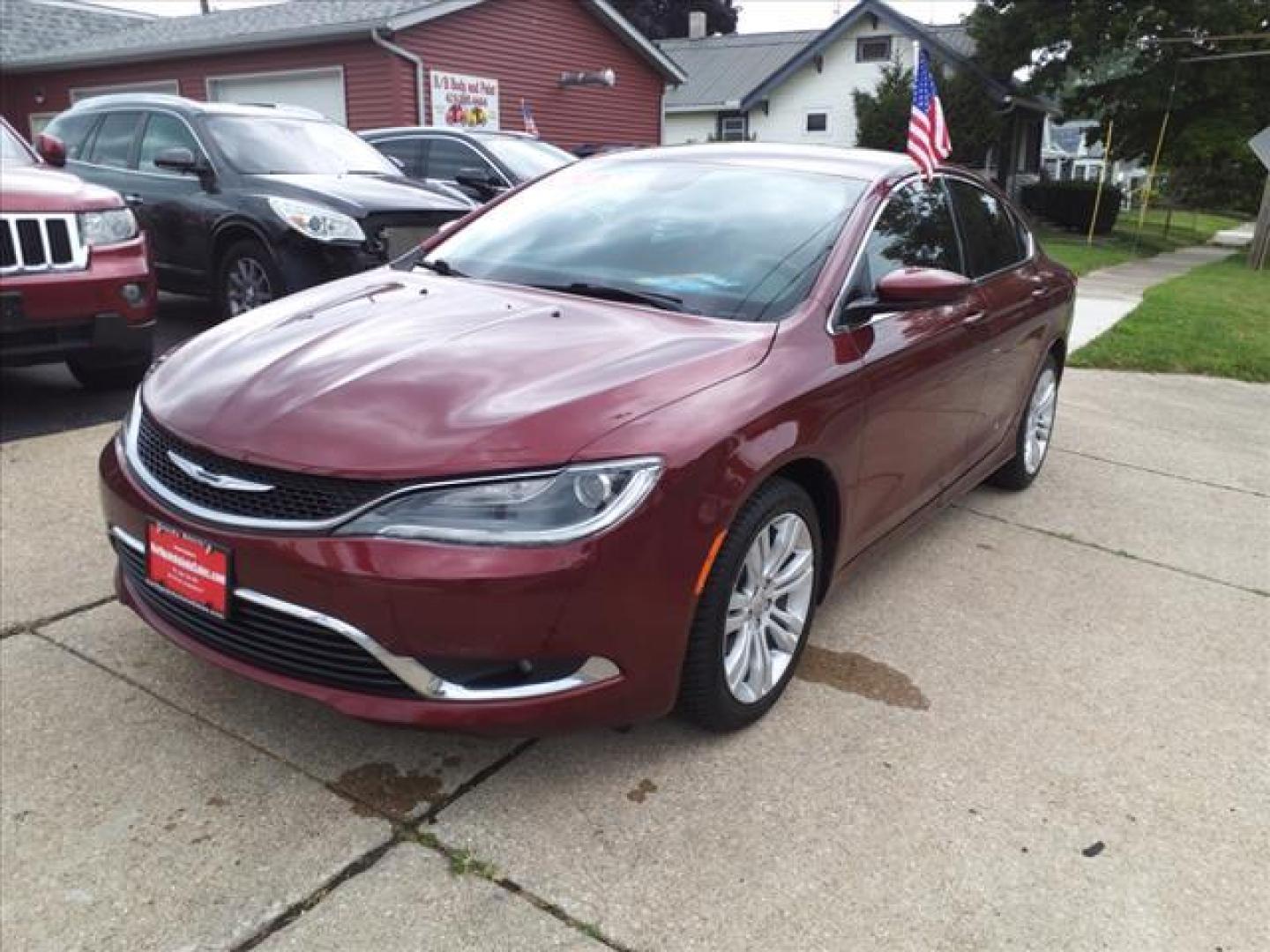 2016 Velvet Red Pearl Coat Chrysler 200 Limited (1C3CCCAB6GN) with an 2.4L 2.4L I4 184hp 173ft. lbs. Sequential Multiport Fuel Injection engine, 9-Speed Shiftable Automatic transmission, located at 5505 N. Summit St., Toledo, OH, 43611, (419) 729-2688, 41.654953, -83.530014 - Photo#20