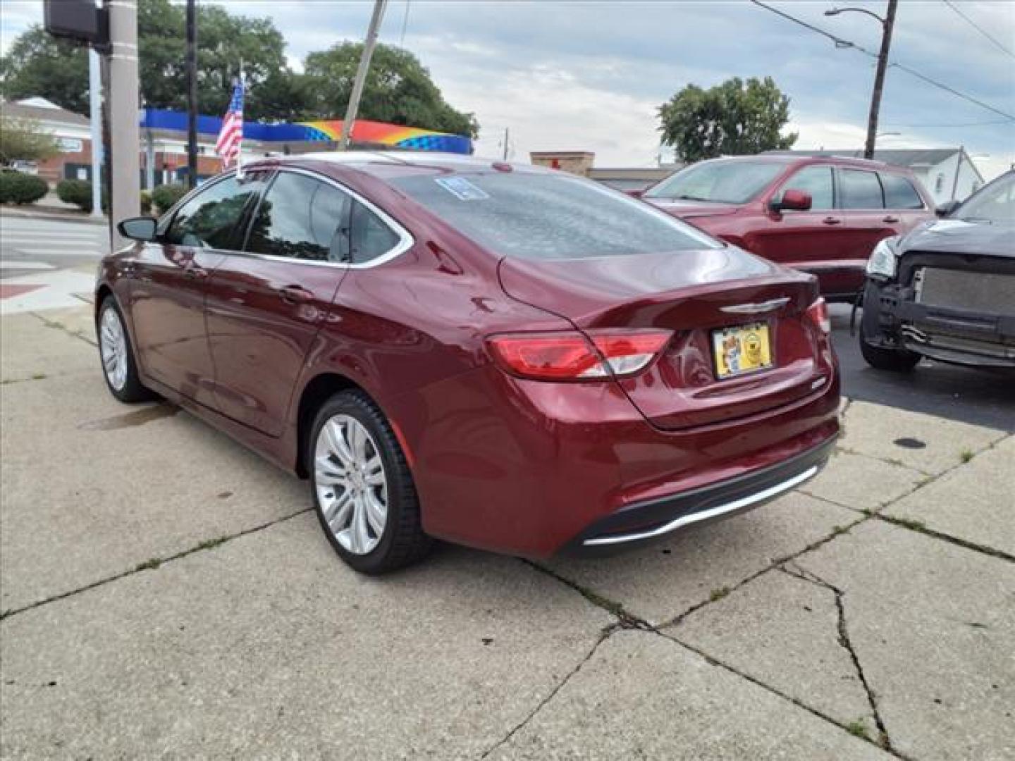 2016 Velvet Red Pearl Coat Chrysler 200 Limited (1C3CCCAB6GN) with an 2.4L 2.4L I4 184hp 173ft. lbs. Sequential Multiport Fuel Injection engine, 9-Speed Shiftable Automatic transmission, located at 5505 N. Summit St., Toledo, OH, 43611, (419) 729-2688, 41.654953, -83.530014 - Photo#22