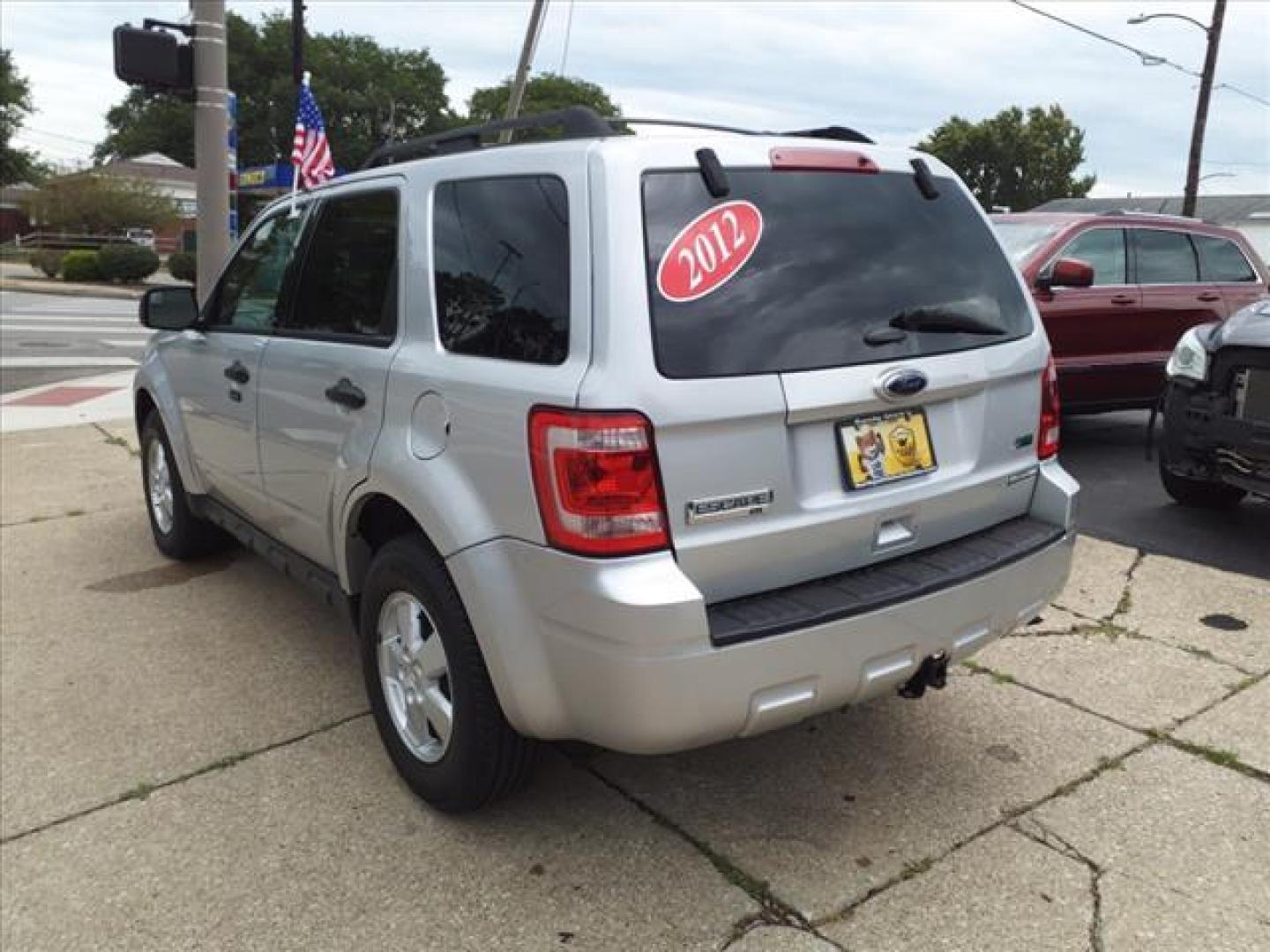 2012 Ingot Silver Metallic Ford Escape XLT (1FMCU0DG7CK) with an 3.0L 3.0L Flex Fuel V6 240hp 223ft. lbs. Sequential Multiport Fuel Injection engine, 6-Speed Automatic transmission, located at 5505 N. Summit St., Toledo, OH, 43611, (419) 729-2688, 41.654953, -83.530014 - Photo#20