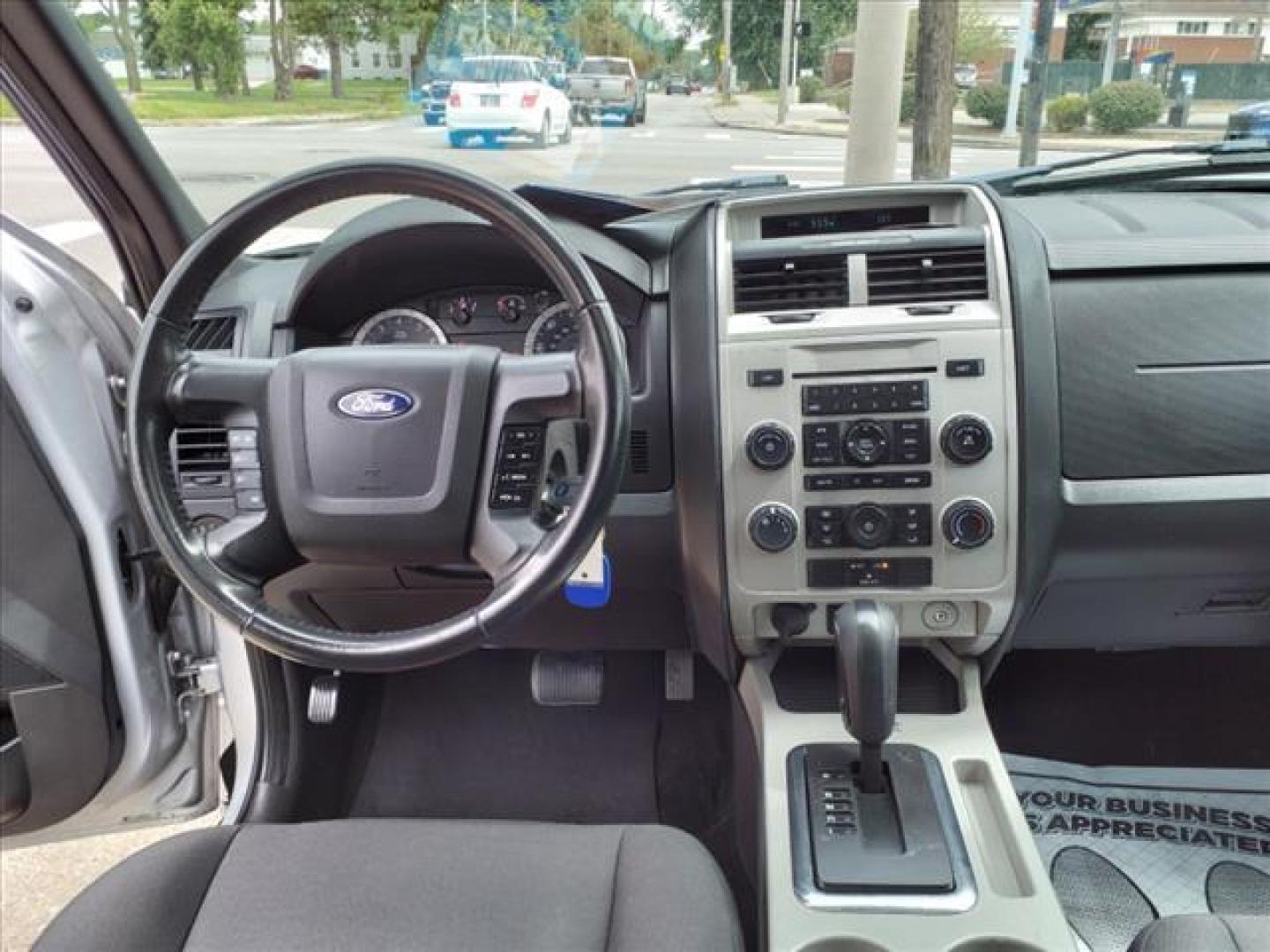 2012 Ingot Silver Metallic Ford Escape XLT (1FMCU0DG7CK) with an 3.0L 3.0L Flex Fuel V6 240hp 223ft. lbs. Sequential Multiport Fuel Injection engine, 6-Speed Automatic transmission, located at 5505 N. Summit St., Toledo, OH, 43611, (419) 729-2688, 41.654953, -83.530014 - Photo#5