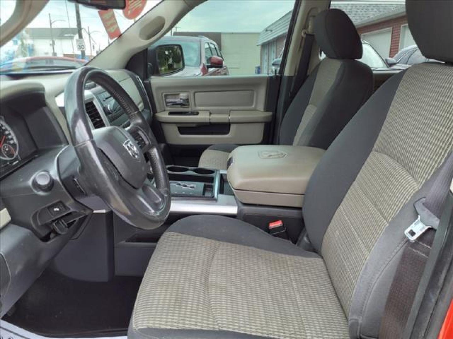 2012 Flame Red Clear Coat/Mineral Gray Metallic Clear C RAM 1500 4x4 Outdoorsman (1C6RD7LT9CS) with an 5.7L HEMI 5.7L V8 390hp 407ft. lbs. Sequential Multiport Fuel Injection engine, 6-Speed Automatic transmission, located at 5505 N. Summit St., Toledo, OH, 43611, (419) 729-2688, 41.654953, -83.530014 - Photo#1