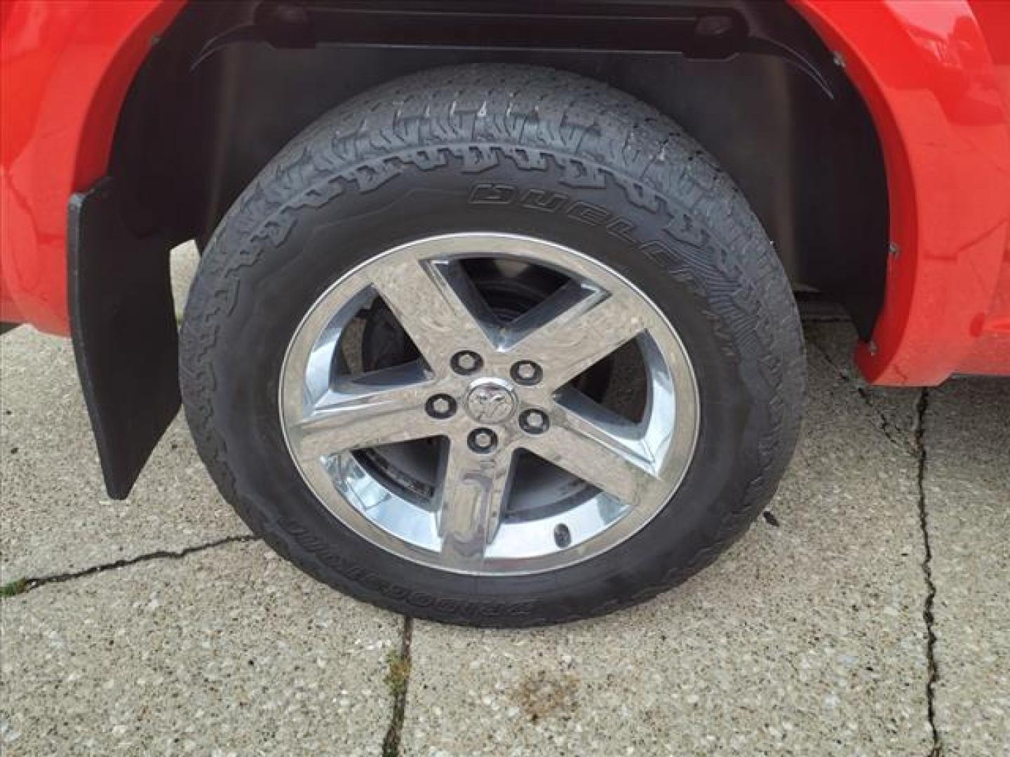 2012 Flame Red Clear Coat/Mineral Gray Metallic Clear C RAM 1500 4x4 Outdoorsman (1C6RD7LT9CS) with an 5.7L HEMI 5.7L V8 390hp 407ft. lbs. Sequential Multiport Fuel Injection engine, 6-Speed Automatic transmission, located at 5505 N. Summit St., Toledo, OH, 43611, (419) 729-2688, 41.654953, -83.530014 - Photo#22