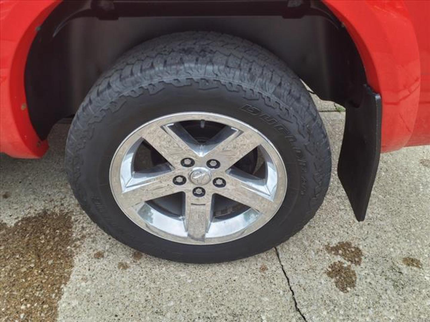 2012 Flame Red Clear Coat/Mineral Gray Metallic Clear C RAM 1500 4x4 Outdoorsman (1C6RD7LT9CS) with an 5.7L HEMI 5.7L V8 390hp 407ft. lbs. Sequential Multiport Fuel Injection engine, 6-Speed Automatic transmission, located at 5505 N. Summit St., Toledo, OH, 43611, (419) 729-2688, 41.654953, -83.530014 - Photo#25