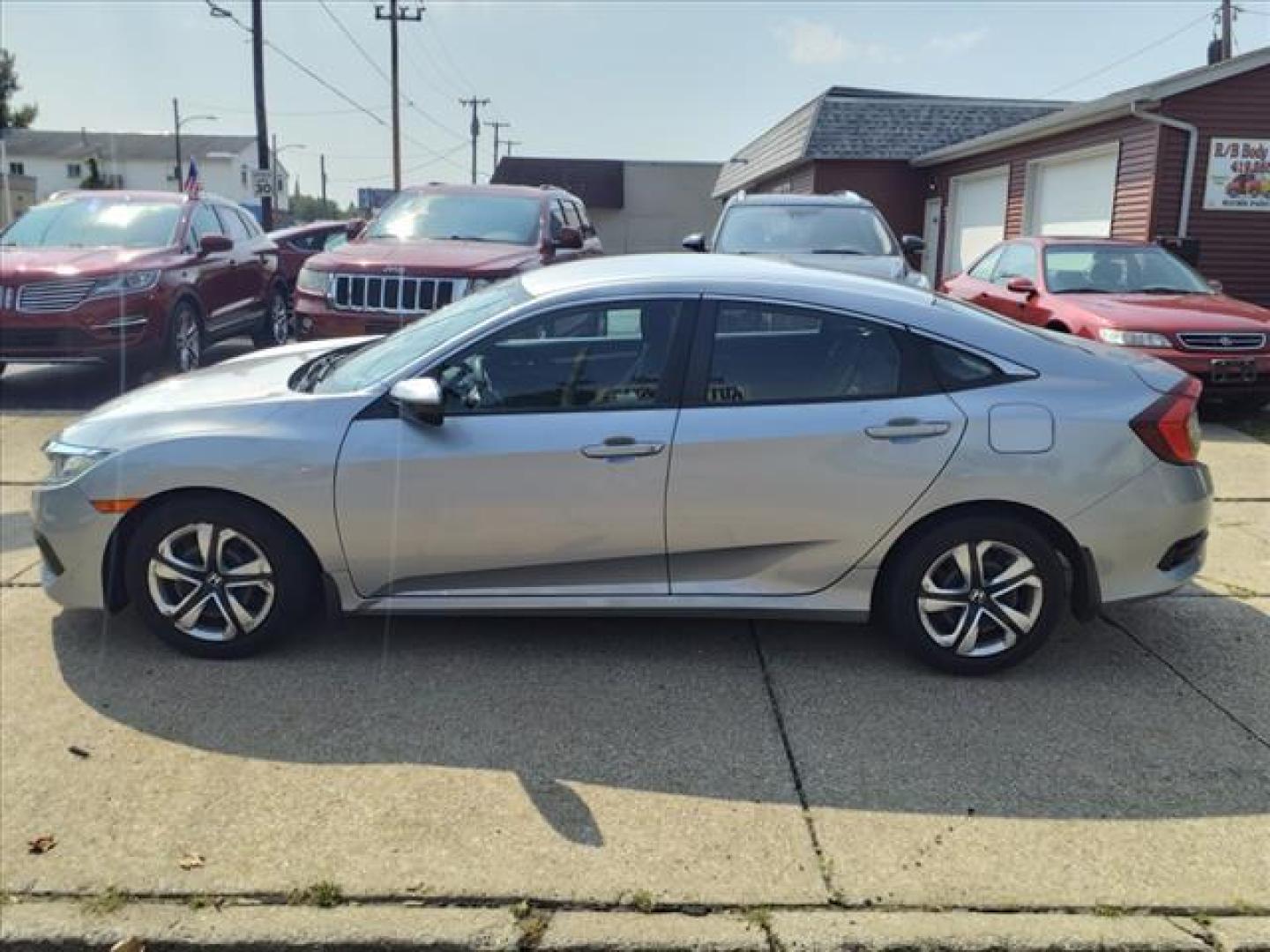 2018 Lunar Silver Metallic Honda Civic LX (2HGFC2F55JH) with an 2.0L 2.0L I4 158hp 138ft. lbs. Sequential Multiport Fuel Injection engine, CVT transmission, located at 5505 N. Summit St., Toledo, OH, 43611, (419) 729-2688, 41.654953, -83.530014 - Photo#15