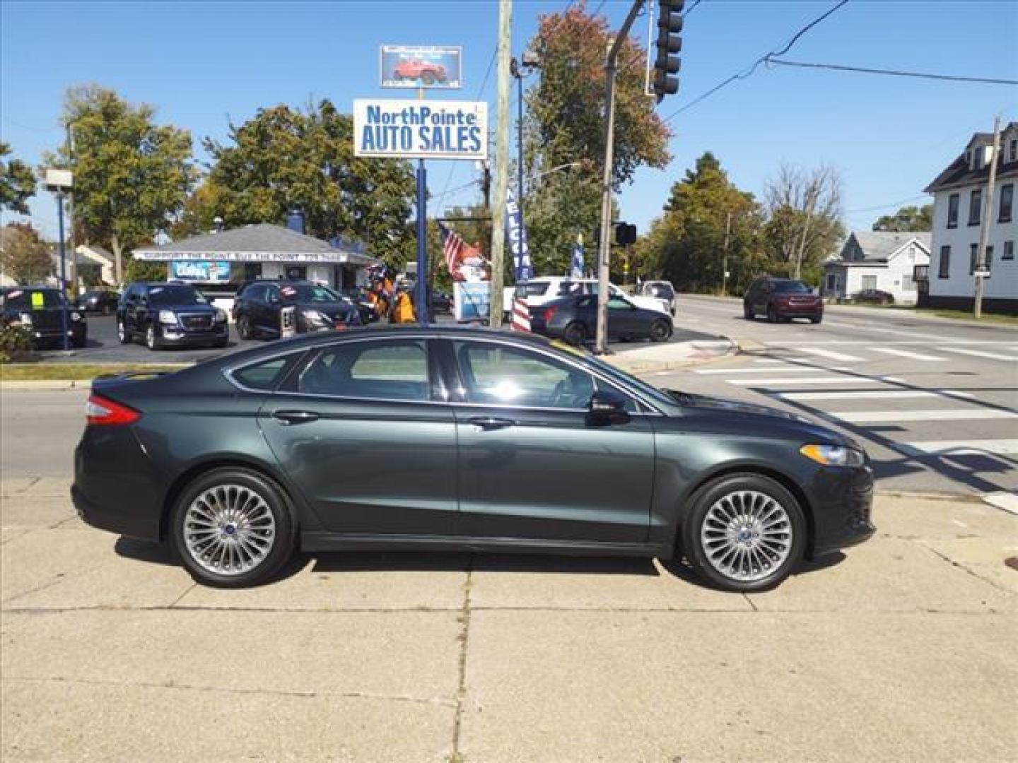 2016 Tectonic Ford Fusion Titanium (3FA6P0K90GR) with an 2.0L EcoBoost 2.0L Turbo I4 240hp 270ft. lbs. Direct Injection engine, 6-Speed Shiftable Automatic transmission, located at 5505 N. Summit St., Toledo, OH, 43611, (419) 729-2688, 41.654953, -83.530014 - Photo#0