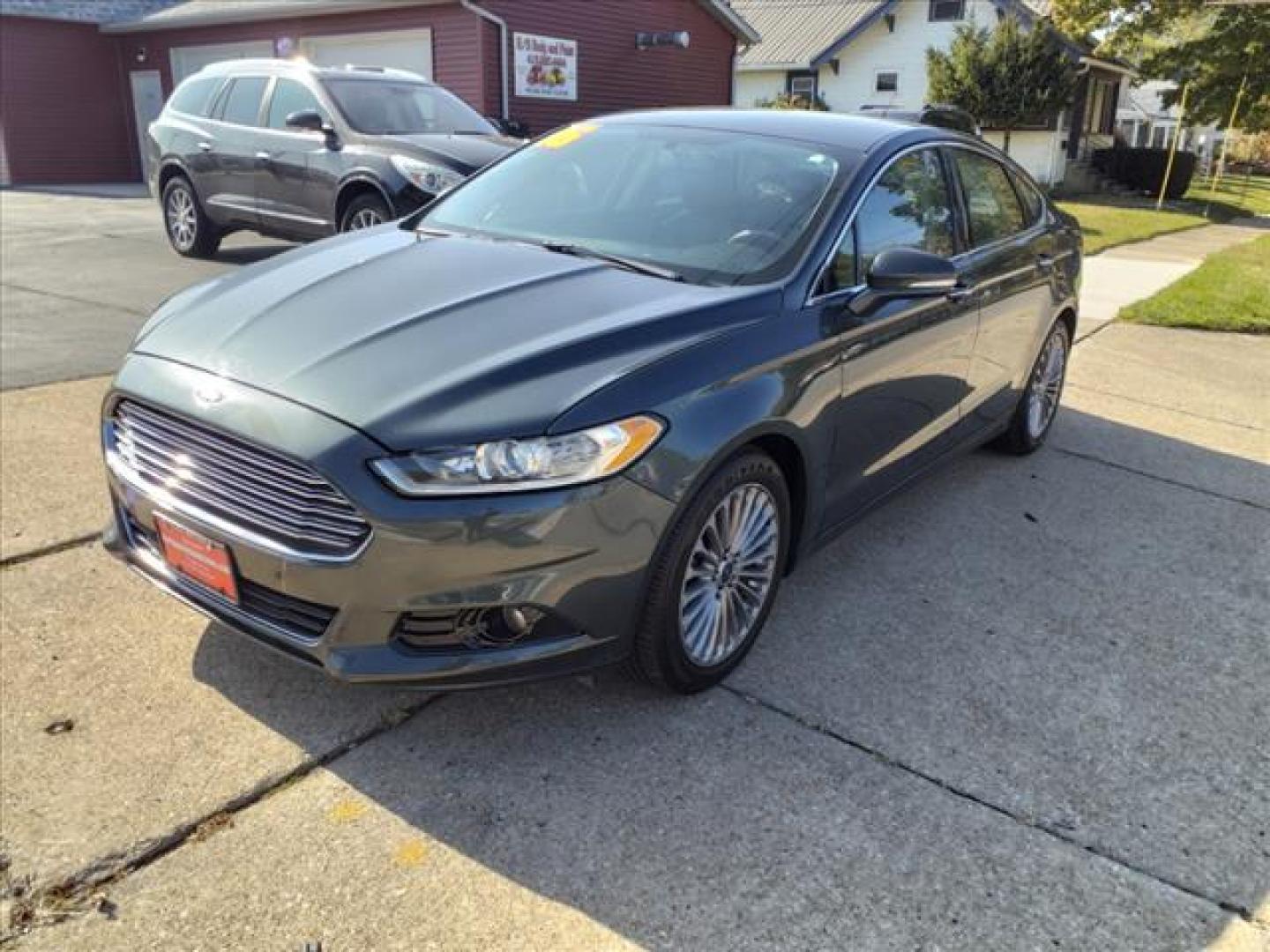 2016 Tectonic Ford Fusion Titanium (3FA6P0K90GR) with an 2.0L EcoBoost 2.0L Turbo I4 240hp 270ft. lbs. Direct Injection engine, 6-Speed Shiftable Automatic transmission, located at 5505 N. Summit St., Toledo, OH, 43611, (419) 729-2688, 41.654953, -83.530014 - Photo#19