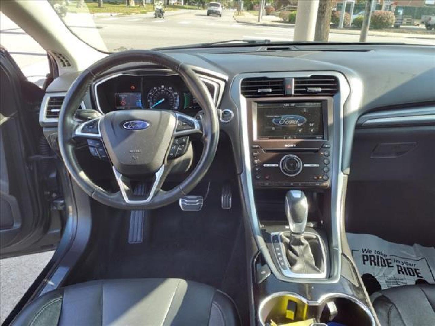 2016 Tectonic Ford Fusion Titanium (3FA6P0K90GR) with an 2.0L EcoBoost 2.0L Turbo I4 240hp 270ft. lbs. Direct Injection engine, 6-Speed Shiftable Automatic transmission, located at 5505 N. Summit St., Toledo, OH, 43611, (419) 729-2688, 41.654953, -83.530014 - Photo#4