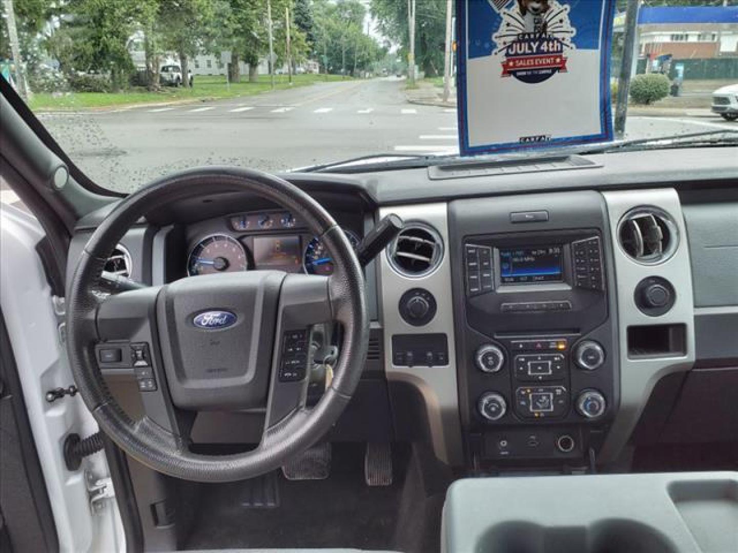 2014 Oxford White Ford F-150 4x4 XLT (1FTFW1EF0EF) with an 5.0L 5.0L Flex Fuel V8 360hp 380ft. lbs. Sequential Multiport Fuel Injection engine, 6-Speed Automatic transmission, located at 5505 N. Summit St., Toledo, OH, 43611, (419) 729-2688, 41.654953, -83.530014 - Photo#4