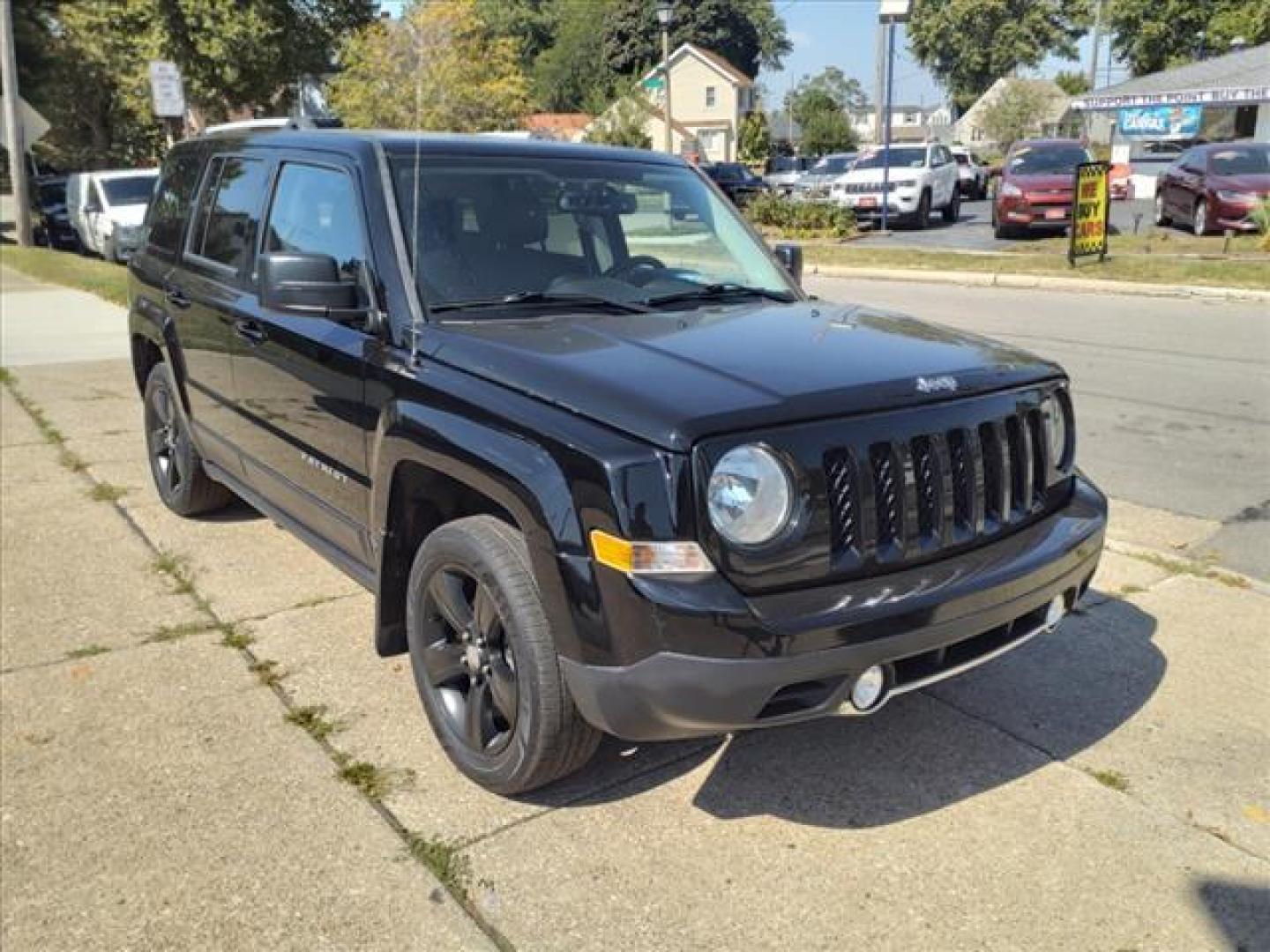 2016 Black Clear Coat Jeep Patriot High Altitude (1C4NJPFA0GD) with an 2.0L 2.0L I4 158hp 141ft. lbs. Sequential Multiport Fuel Injection engine, CVT transmission, located at 5505 N. Summit St., Toledo, OH, 43611, (419) 729-2688, 41.654953, -83.530014 - Photo#14