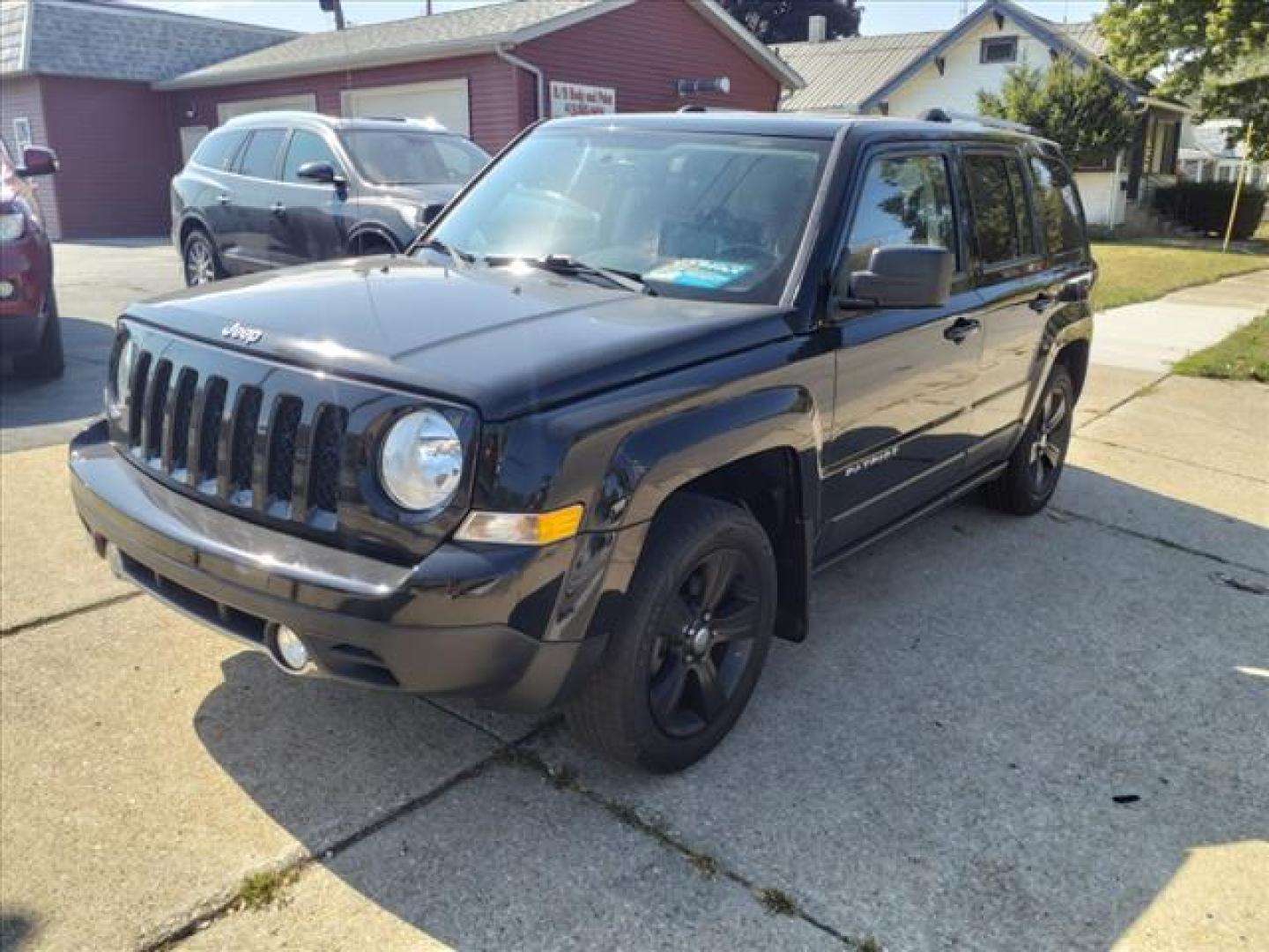 2016 Black Clear Coat Jeep Patriot High Altitude (1C4NJPFA0GD) with an 2.0L 2.0L I4 158hp 141ft. lbs. Sequential Multiport Fuel Injection engine, CVT transmission, located at 5505 N. Summit St., Toledo, OH, 43611, (419) 729-2688, 41.654953, -83.530014 - Photo#16