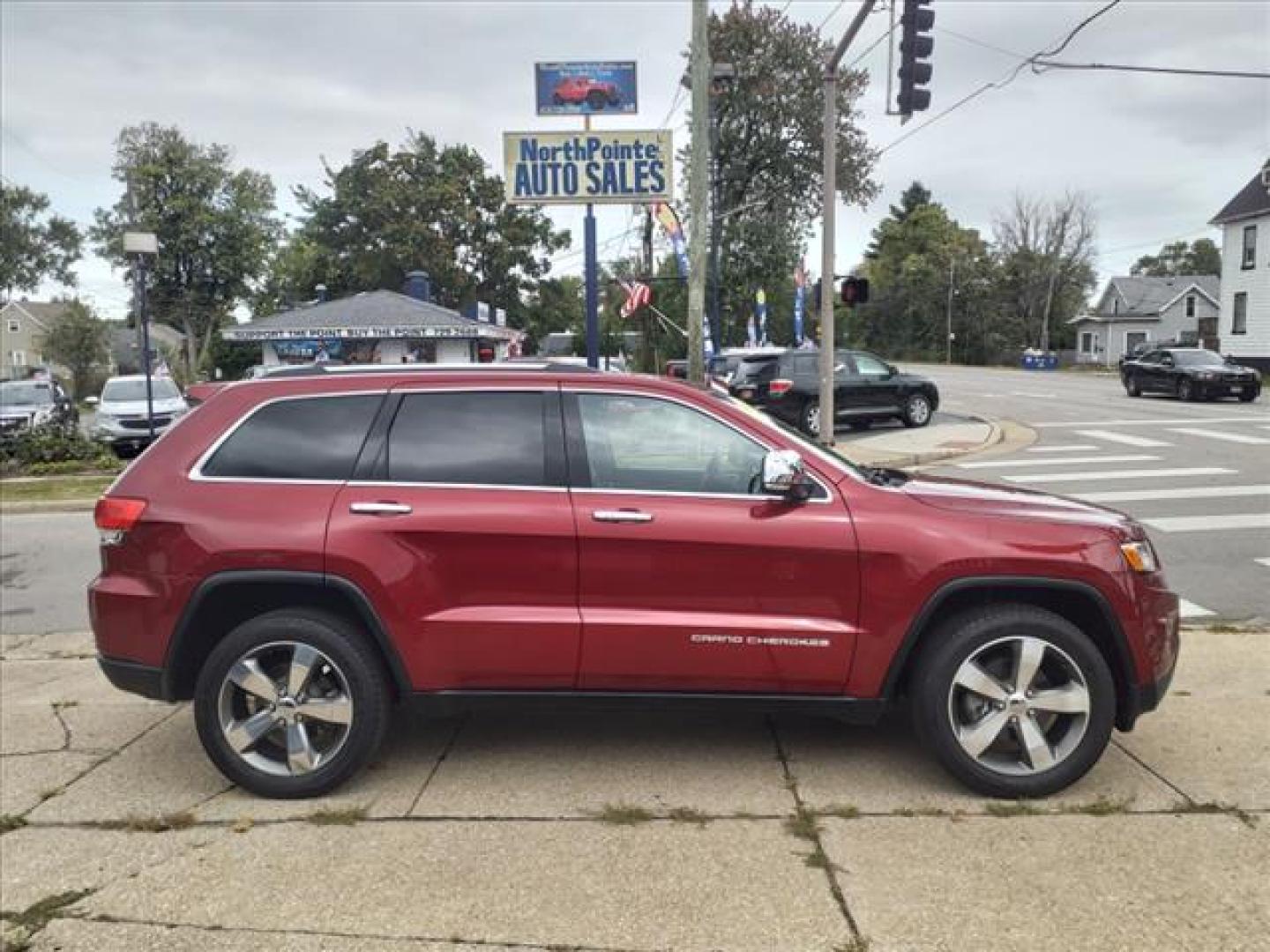 2015 Deep Cherry Red Crystal Pearl Coat Jeep Grand Cherokee 4x4 Limited (1C4RJFBG8FC) with an 3.6L 3.6L V6 290hp 260ft. lbs. Sequential Multiport Fuel Injection engine, 8-Speed Shiftable Automatic transmission, located at 5505 N. Summit St., Toledo, OH, 43611, (419) 729-2688, 41.654953, -83.530014 - Photo#0