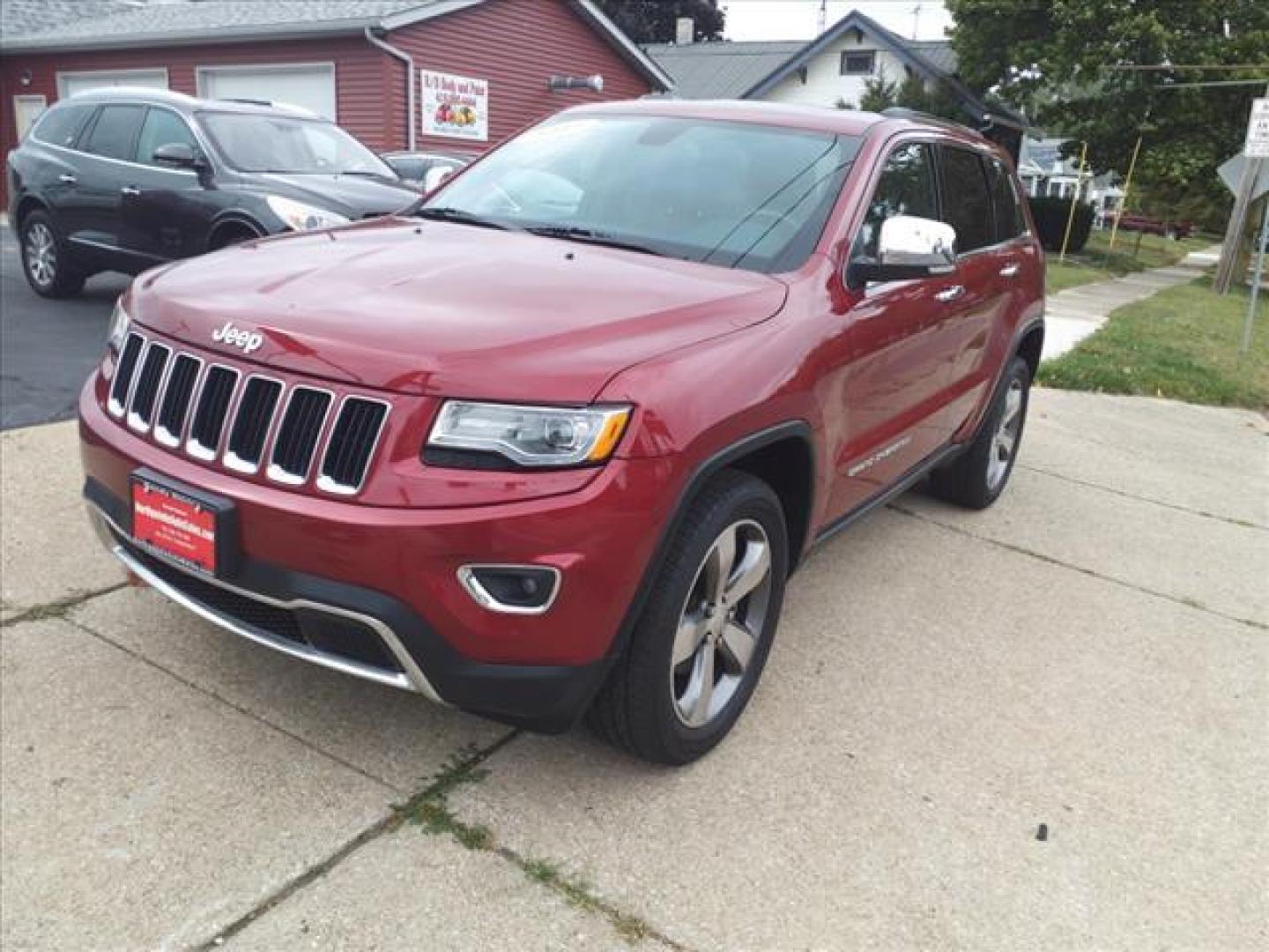 2015 Deep Cherry Red Crystal Pearl Coat Jeep Grand Cherokee 4x4 Limited (1C4RJFBG8FC) with an 3.6L 3.6L V6 290hp 260ft. lbs. Sequential Multiport Fuel Injection engine, 8-Speed Shiftable Automatic transmission, located at 5505 N. Summit St., Toledo, OH, 43611, (419) 729-2688, 41.654953, -83.530014 - Photo#23