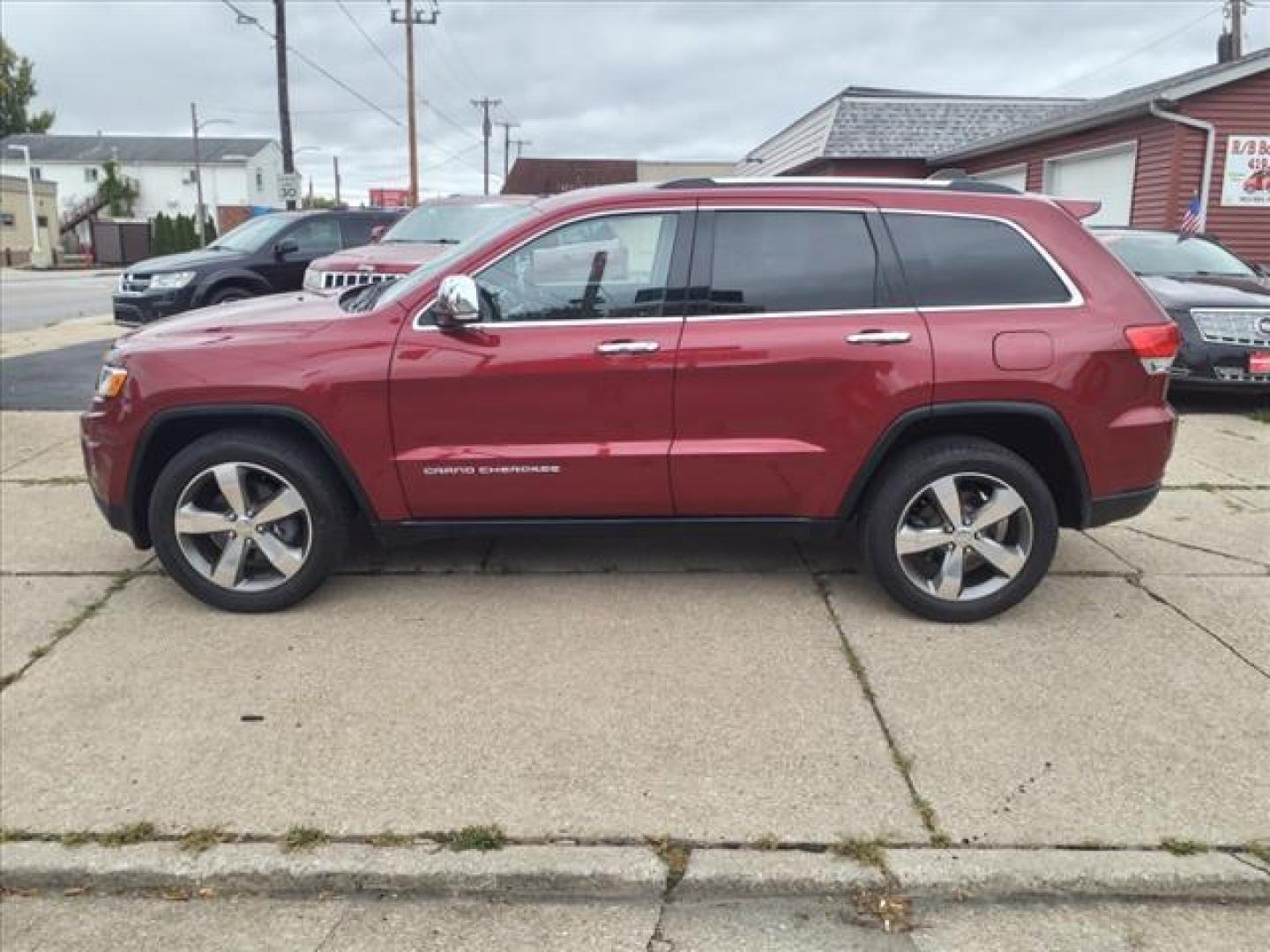 2015 Deep Cherry Red Crystal Pearl Coat Jeep Grand Cherokee 4x4 Limited (1C4RJFBG8FC) with an 3.6L 3.6L V6 290hp 260ft. lbs. Sequential Multiport Fuel Injection engine, 8-Speed Shiftable Automatic transmission, located at 5505 N. Summit St., Toledo, OH, 43611, (419) 729-2688, 41.654953, -83.530014 - Photo#24