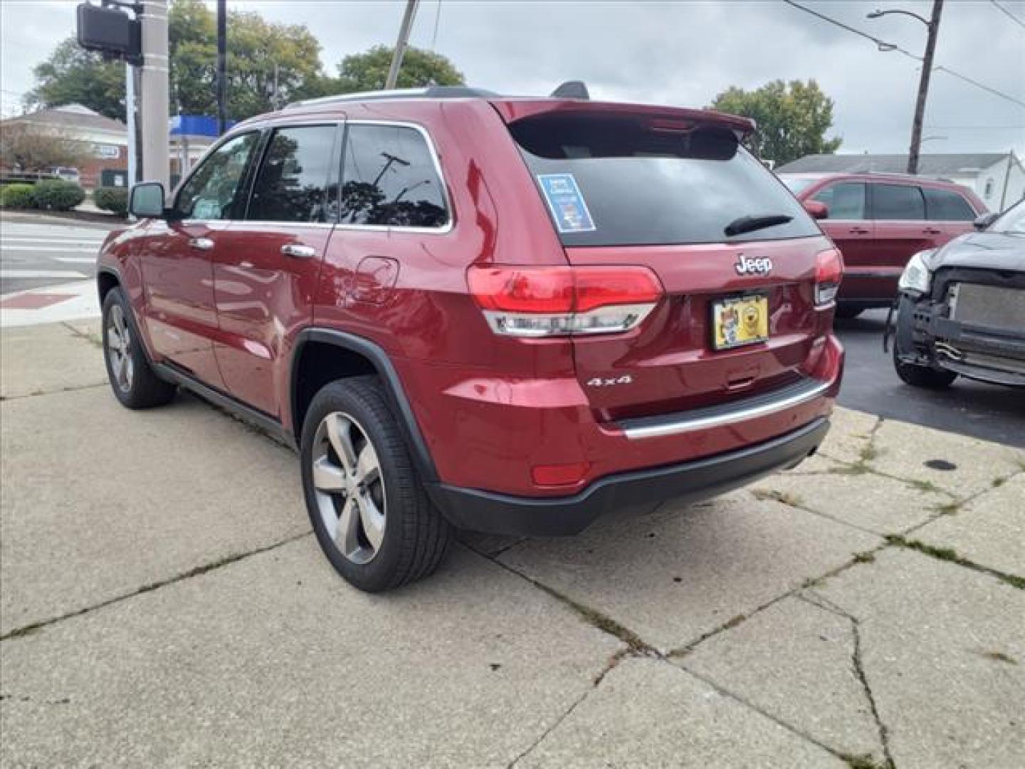 2015 Deep Cherry Red Crystal Pearl Coat Jeep Grand Cherokee 4x4 Limited (1C4RJFBG8FC) with an 3.6L 3.6L V6 290hp 260ft. lbs. Sequential Multiport Fuel Injection engine, 8-Speed Shiftable Automatic transmission, located at 5505 N. Summit St., Toledo, OH, 43611, (419) 729-2688, 41.654953, -83.530014 - Photo#25