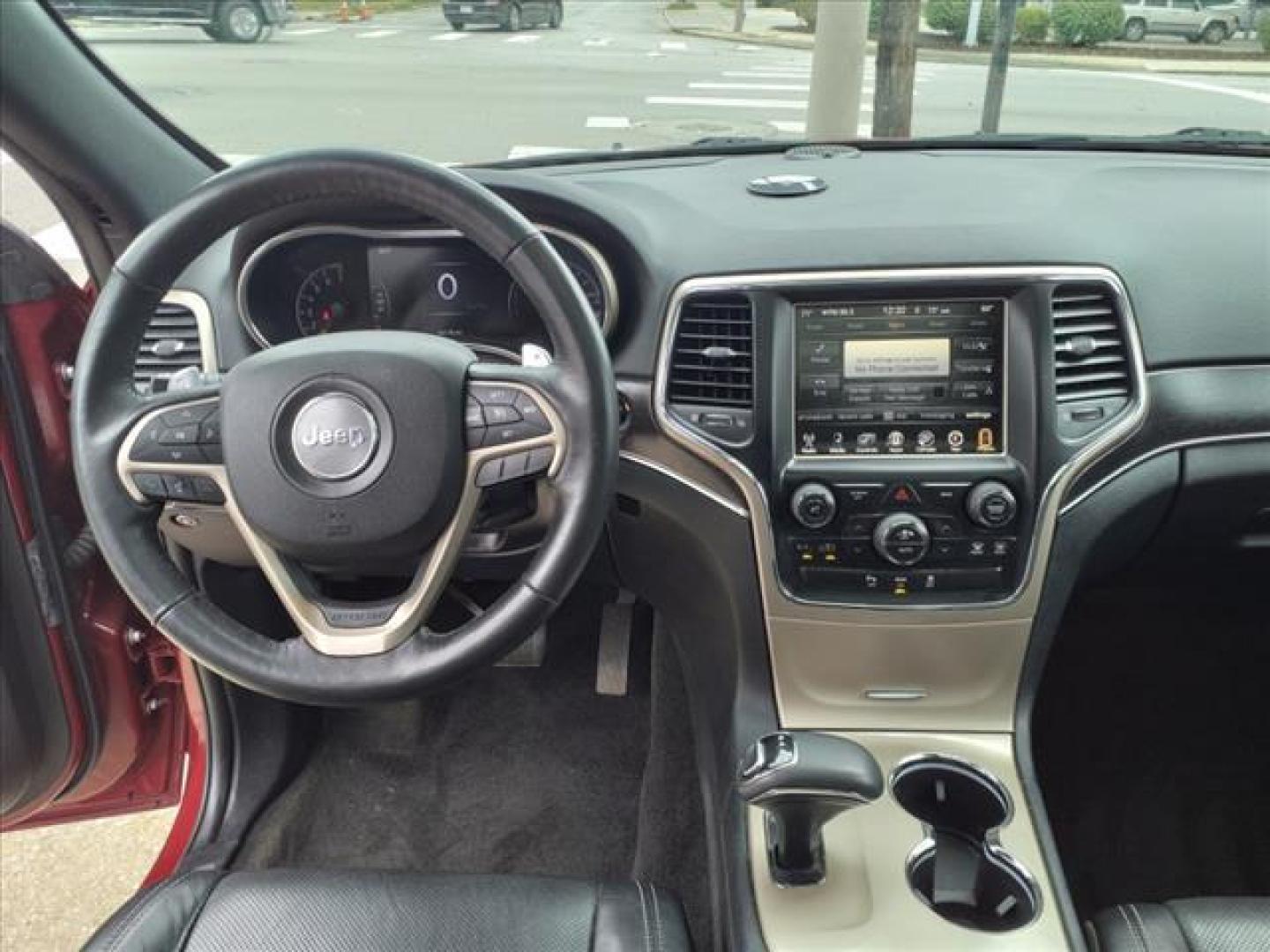 2015 Deep Cherry Red Crystal Pearl Coat Jeep Grand Cherokee 4x4 Limited (1C4RJFBG8FC) with an 3.6L 3.6L V6 290hp 260ft. lbs. Sequential Multiport Fuel Injection engine, 8-Speed Shiftable Automatic transmission, located at 5505 N. Summit St., Toledo, OH, 43611, (419) 729-2688, 41.654953, -83.530014 - Photo#5